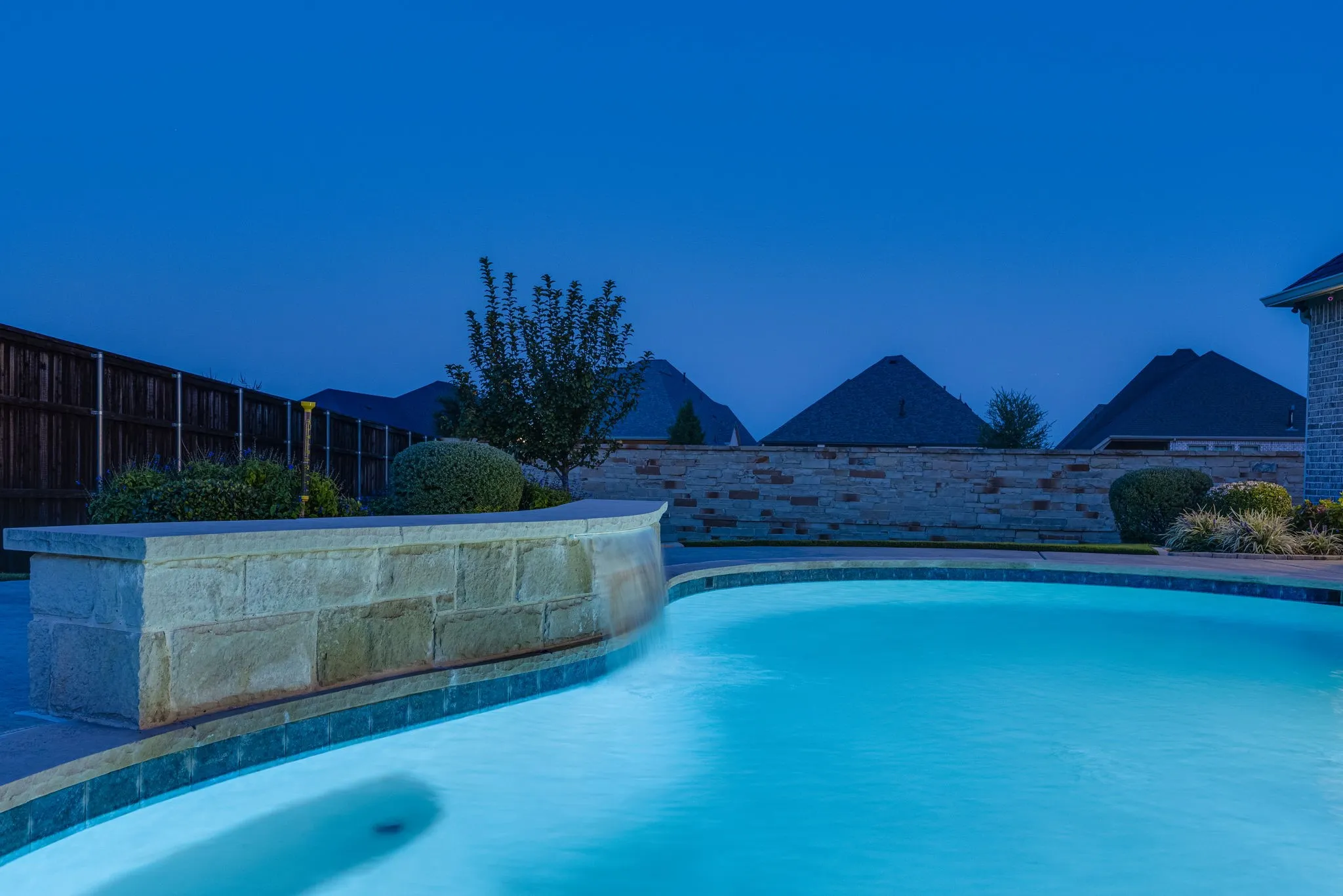 View of swimming pool featuring a fenced backyard