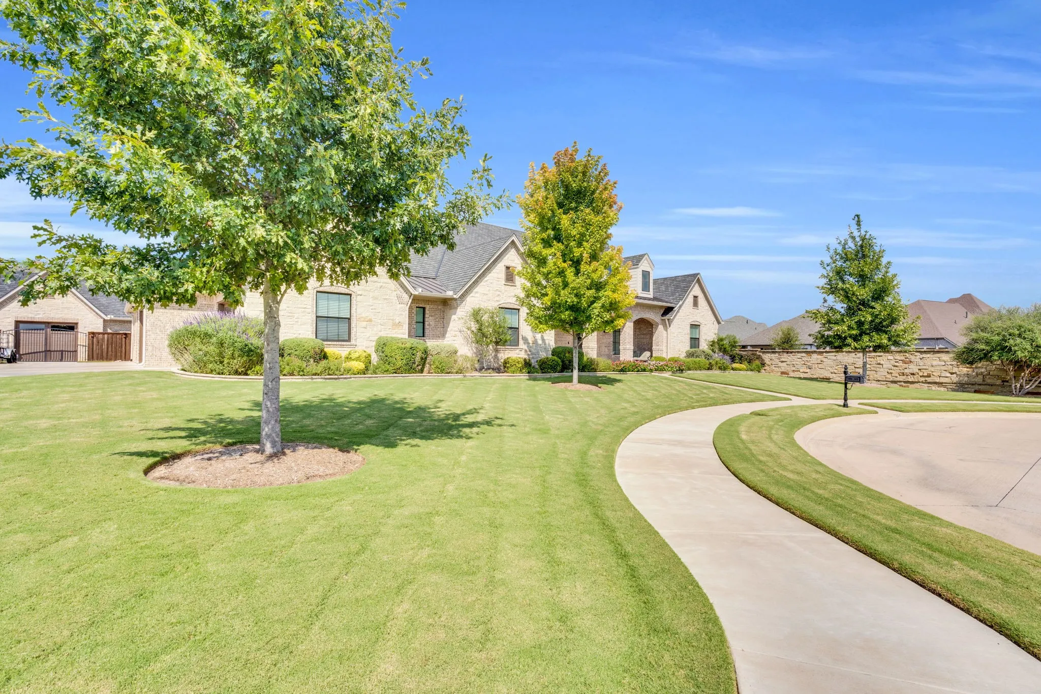 View of property's community featuring a lawn