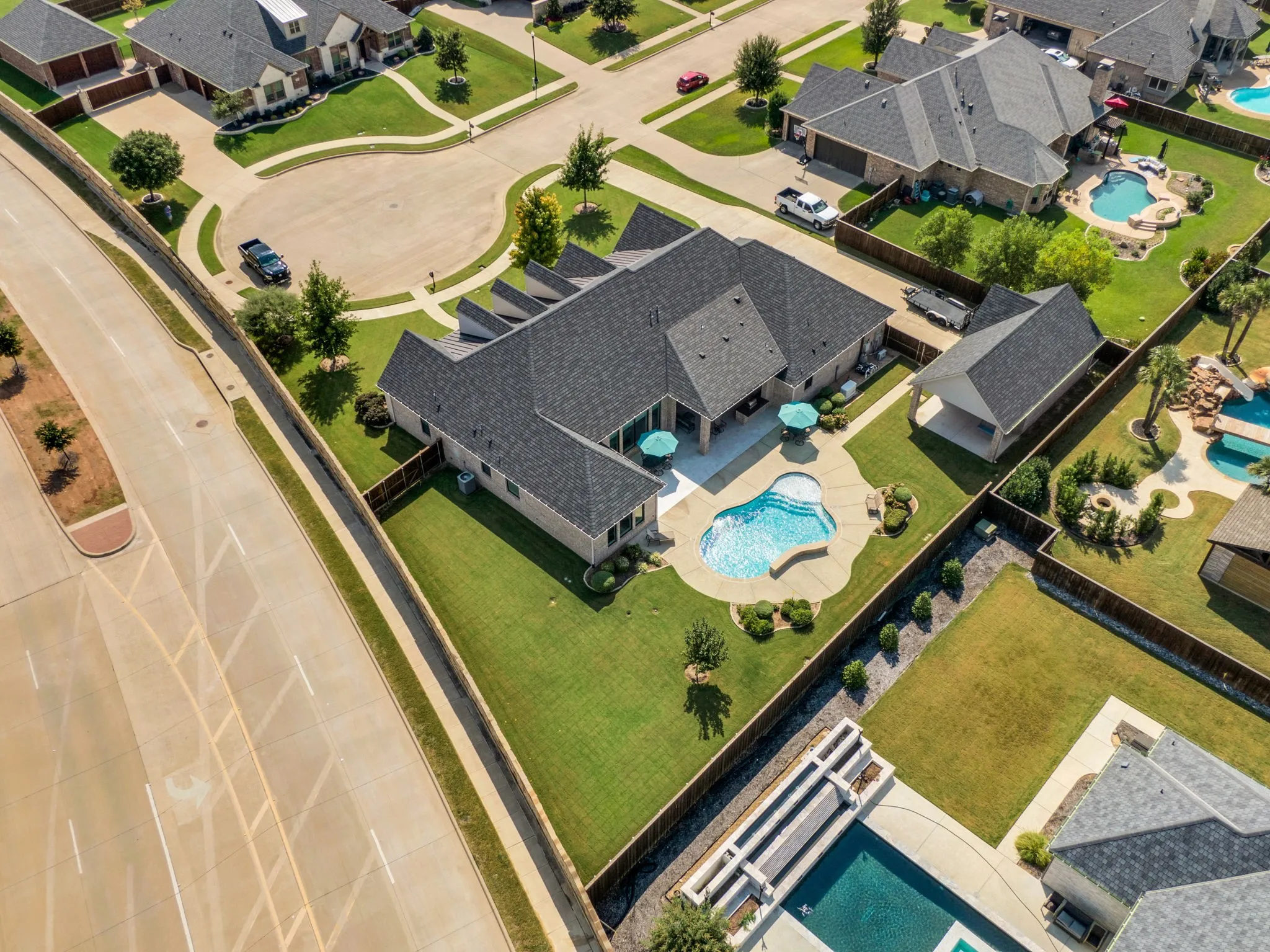 Aerial view of residential area with a pool area