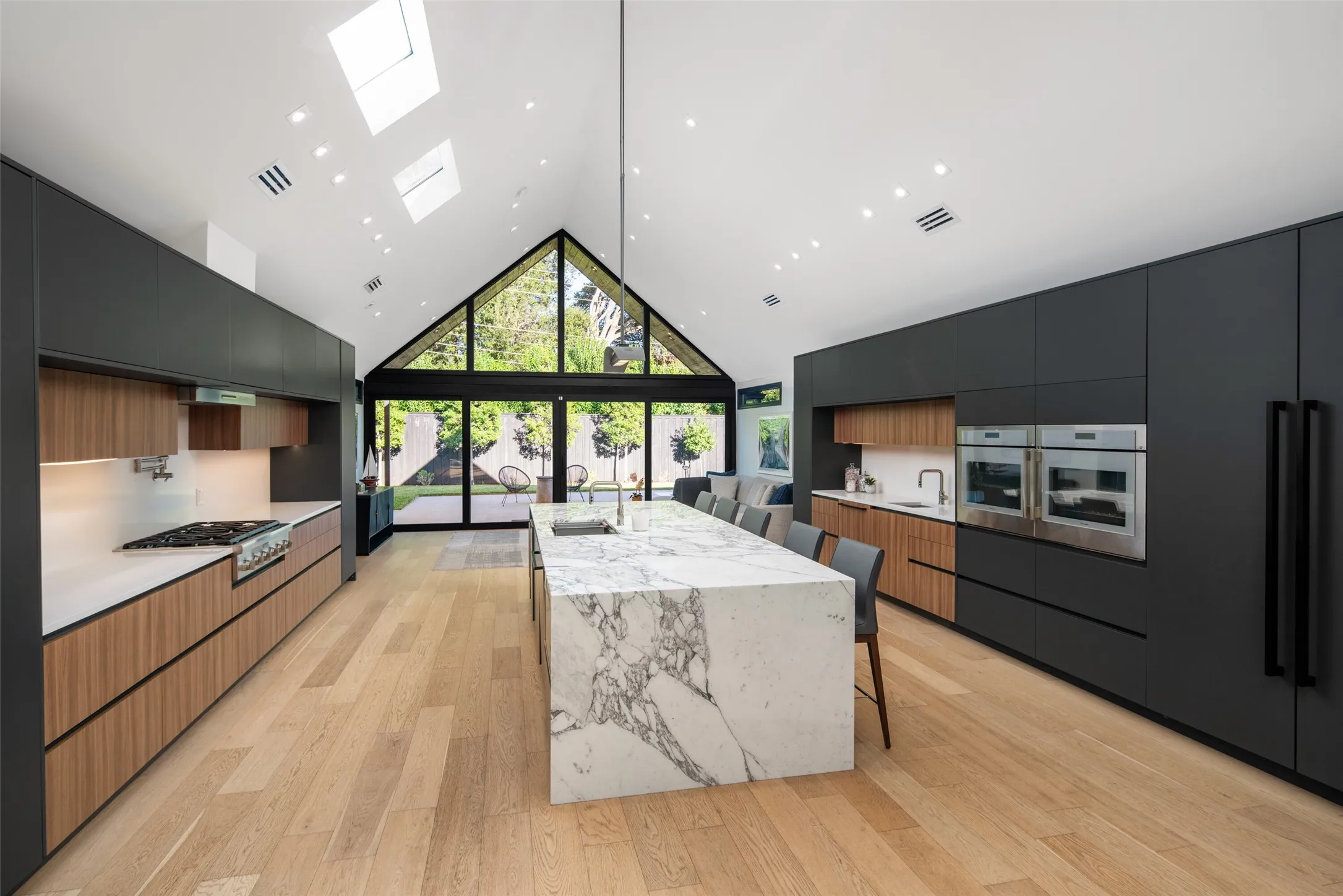 Gourmet kitchen with high end appliances and finishes with designer cabinetry...