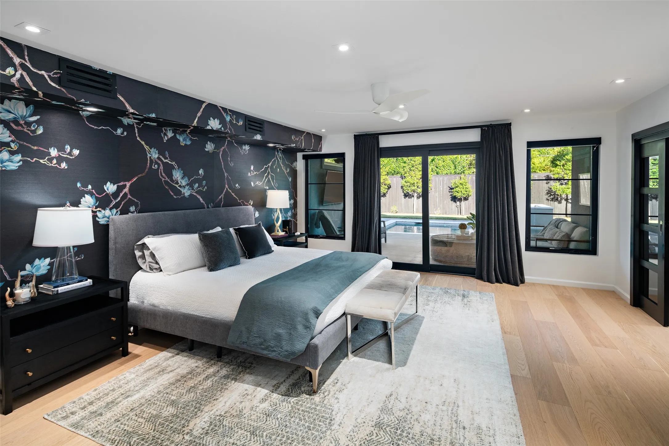 Main primary suite with pool views...