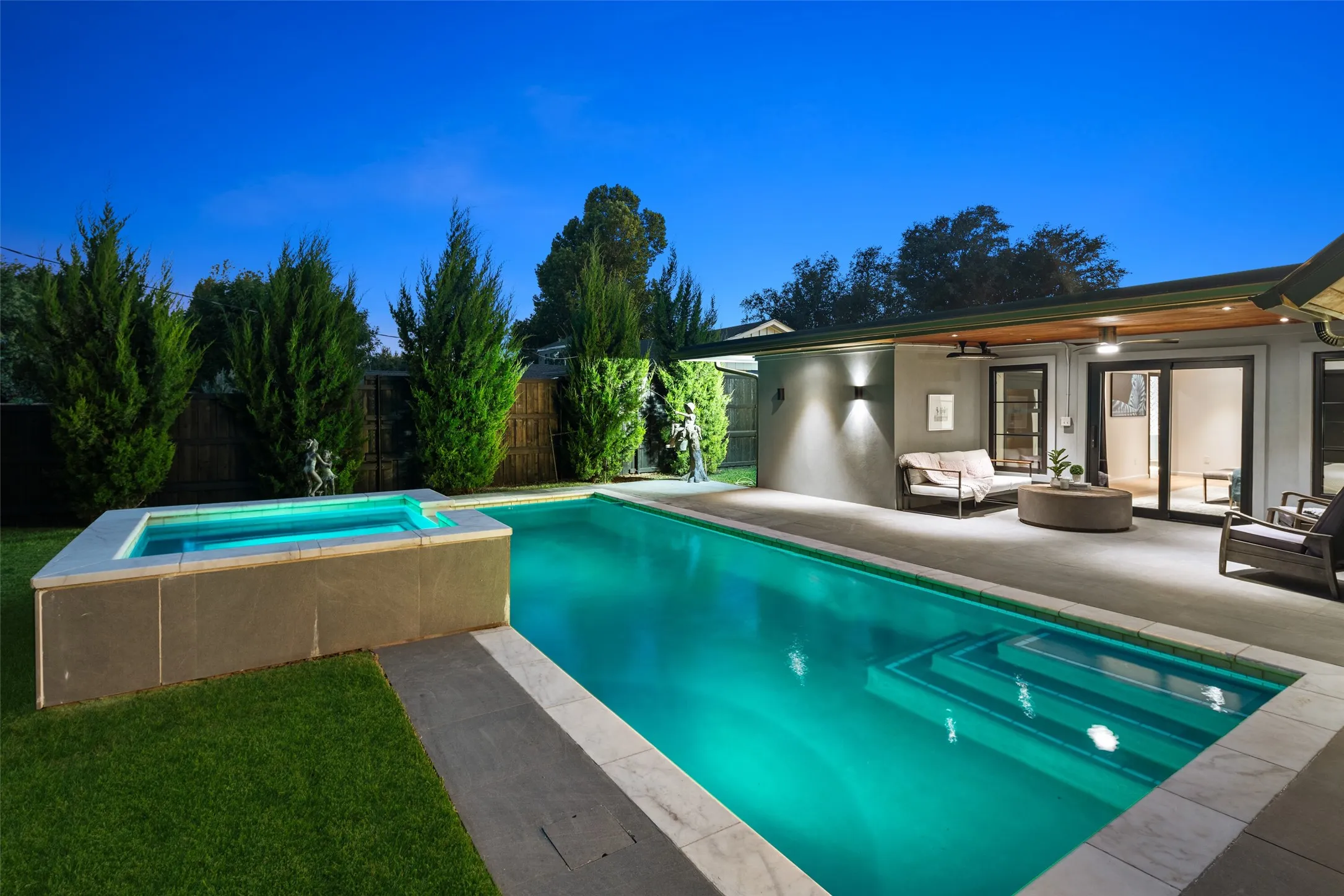 Enjoy the sparkling pool and hot tub...