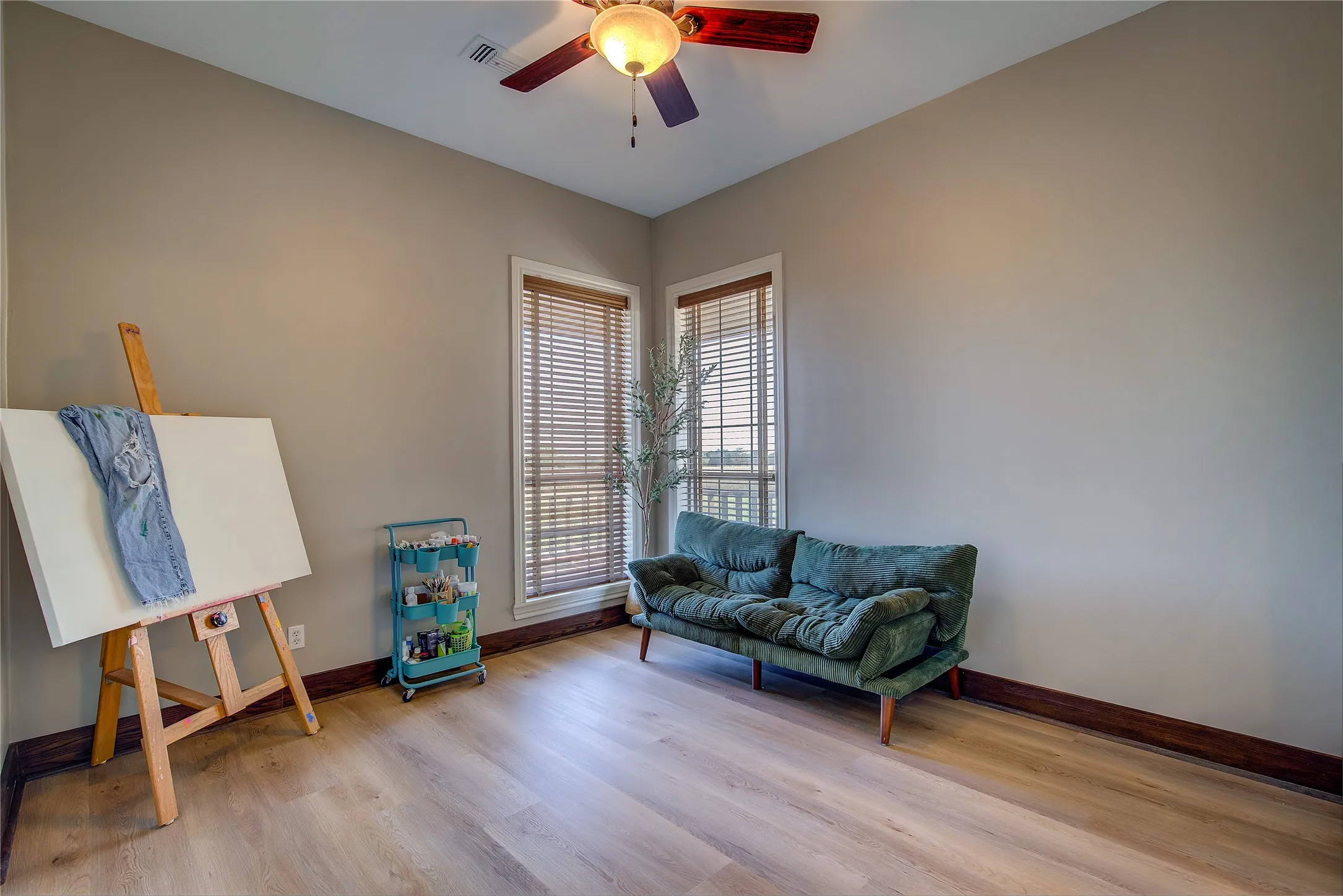2nd bedroom on main floor is bright and calm, with ensuite bath.