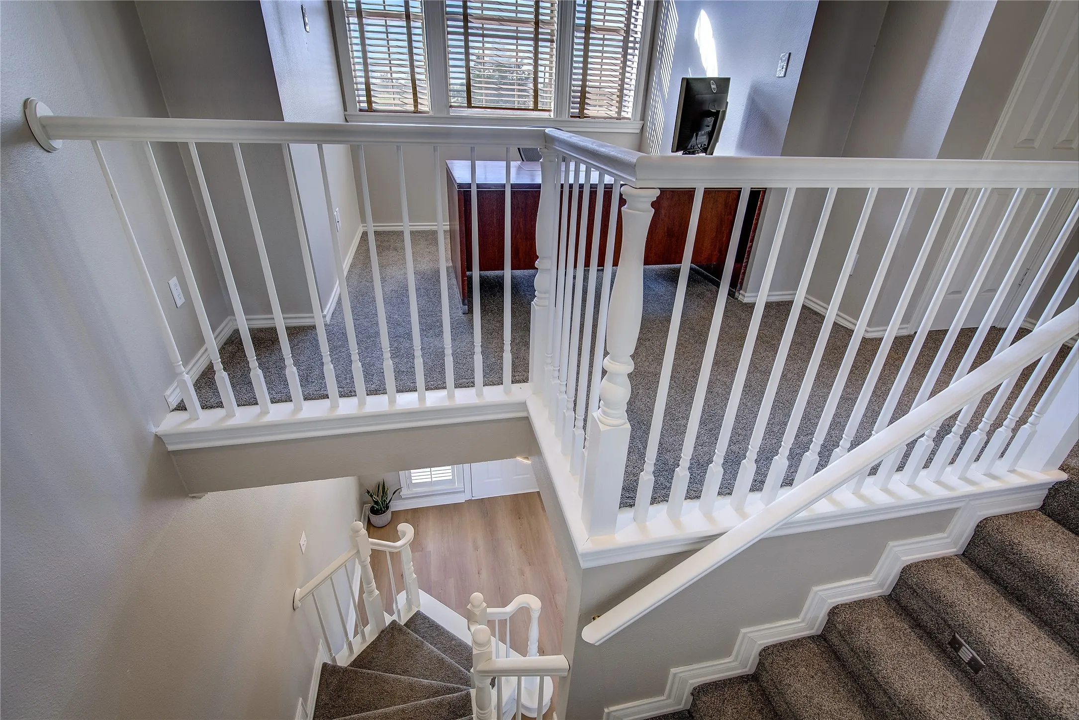 Loft area has plenty of room for desk or play area.