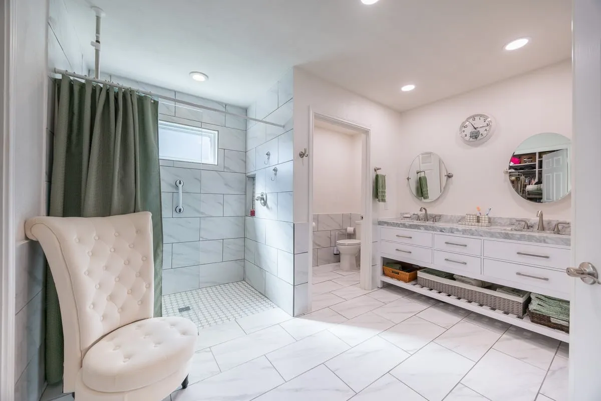 Guest House primary en-suite bath with walk in shower.