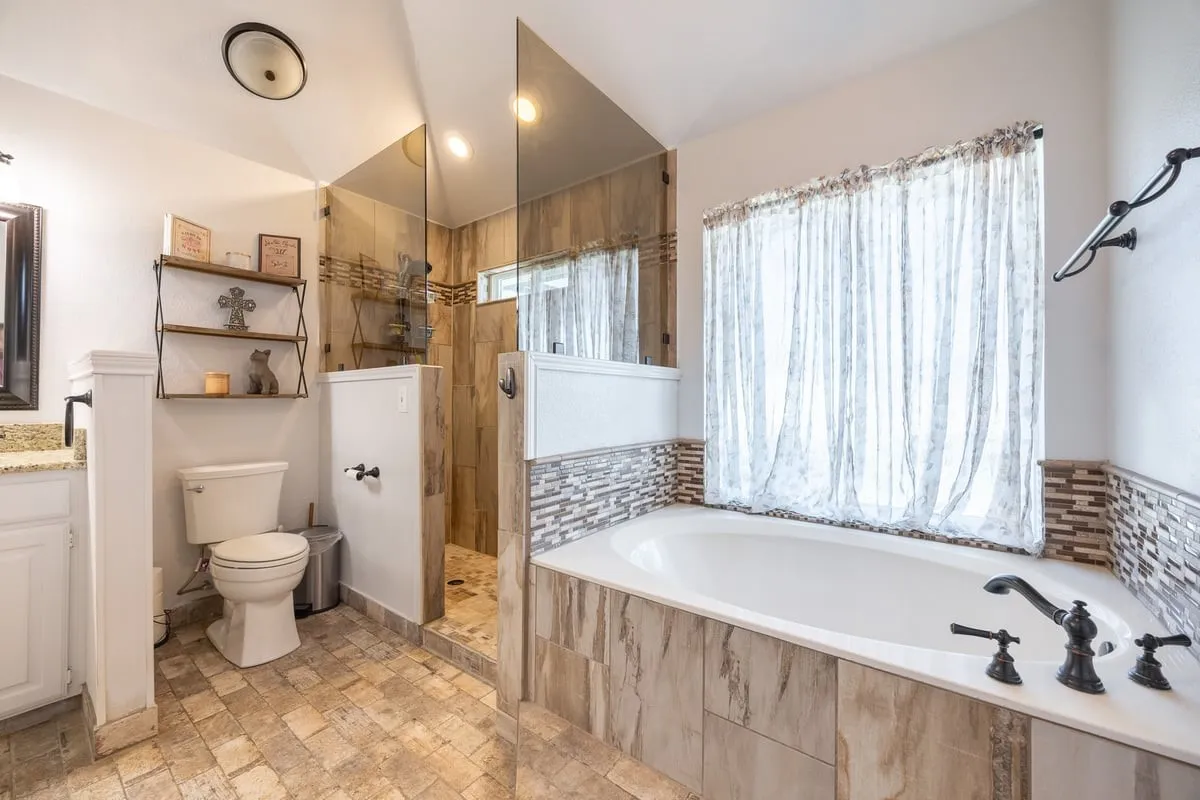 Main House Primary bathroom with garden tub.