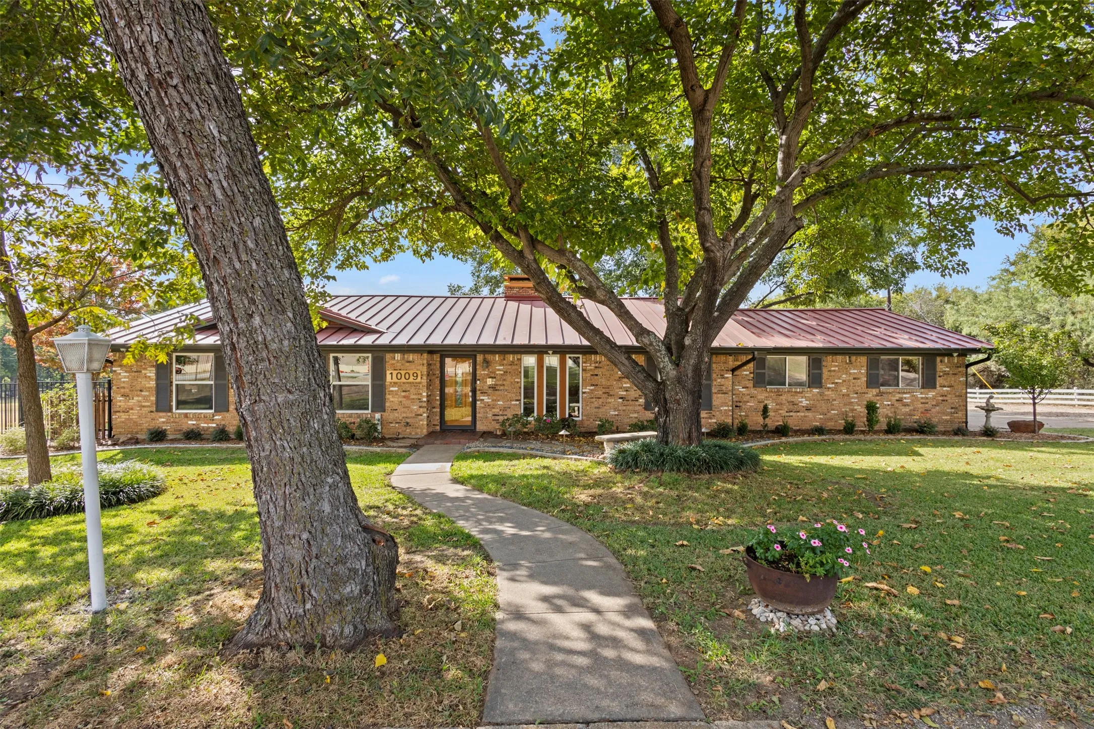 Property features a a 2350 sqft brick building that is perfect for conversion to an office space