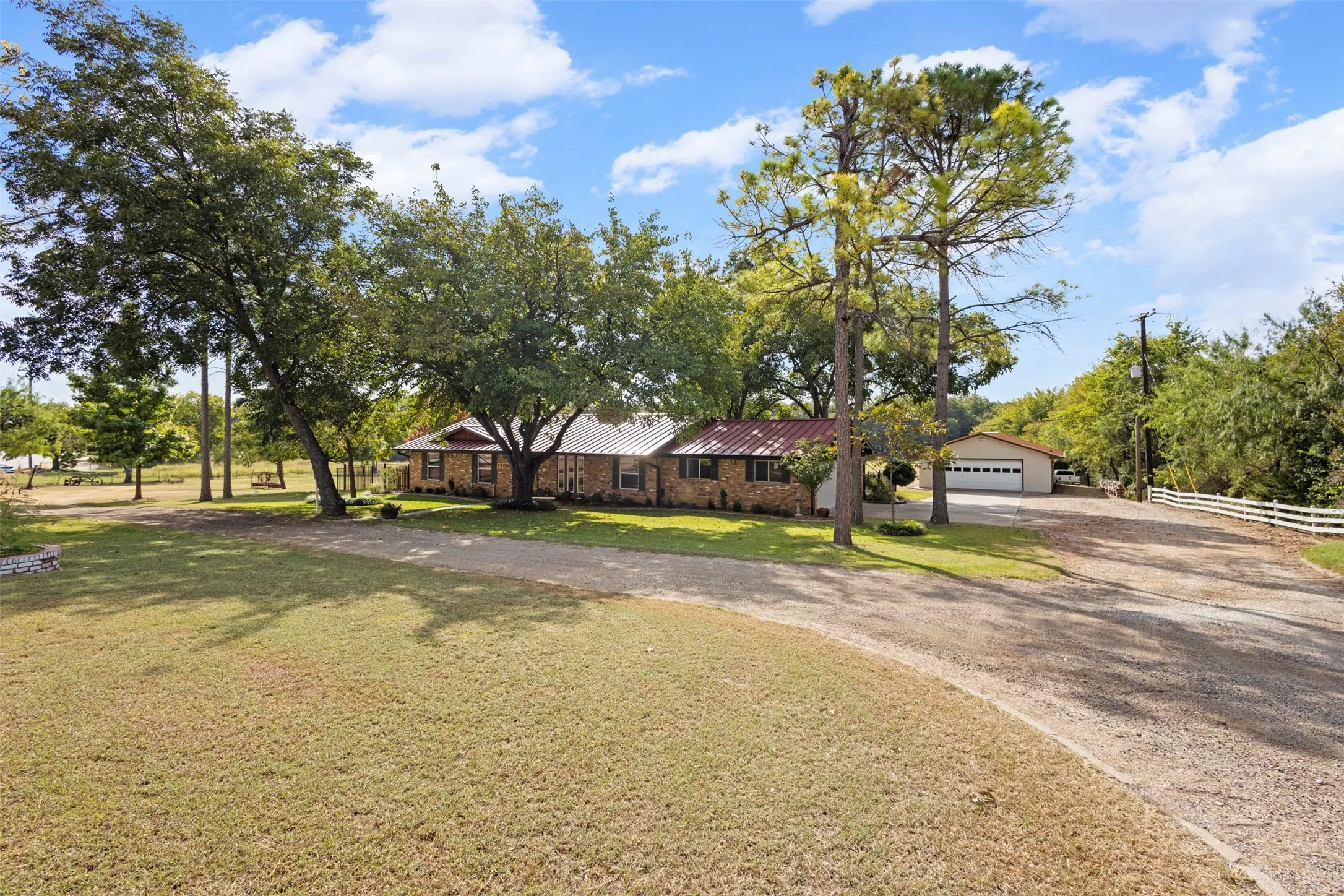 Property features a a 2350 sqft brick building that is perfect for conversion to an office space