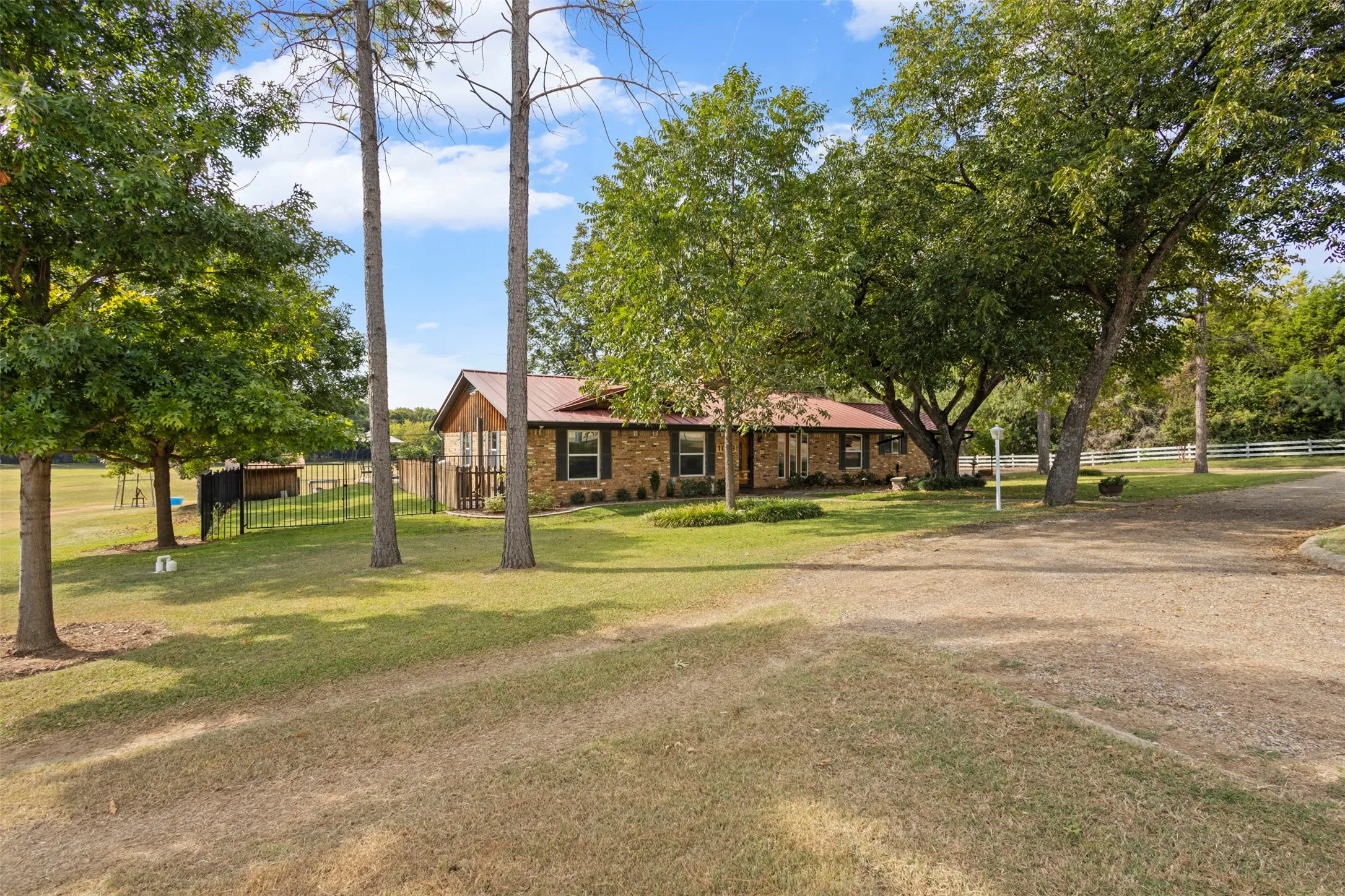 Property features a a 2350 sqft brick building that is perfect for conversion to an office space
