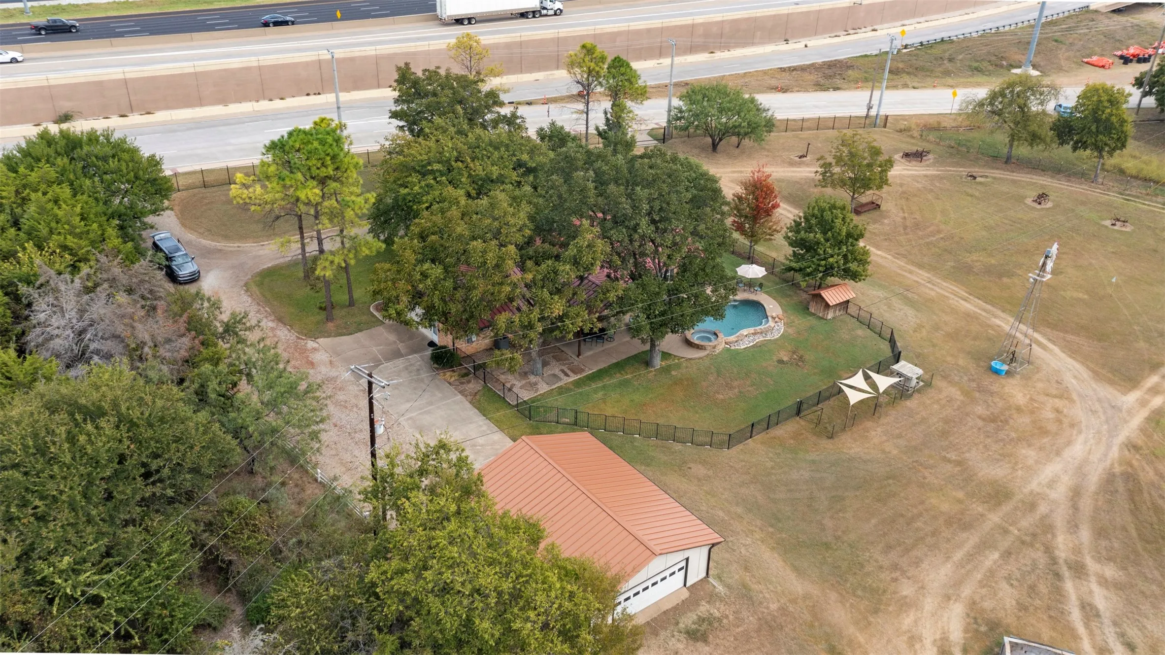 Property features a a 2350 sqft brick building that is perfect for conversion to an office space