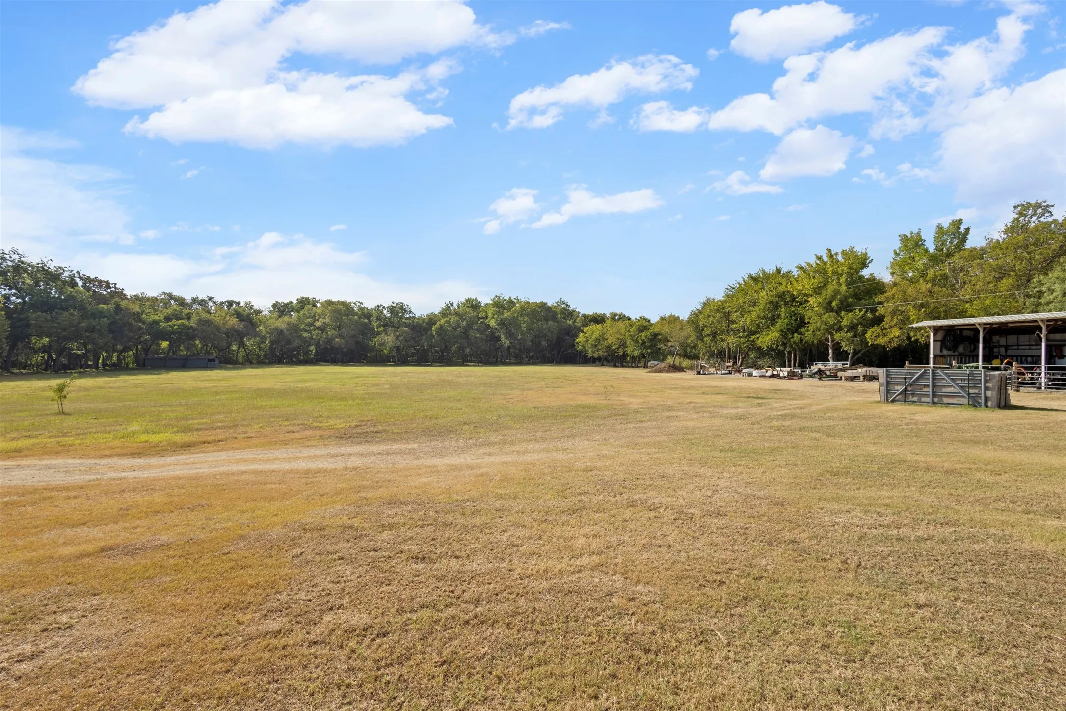 Discover this breathtaking 5.9-acre estate located on East Bound Frontage Road in Grand Prairie.