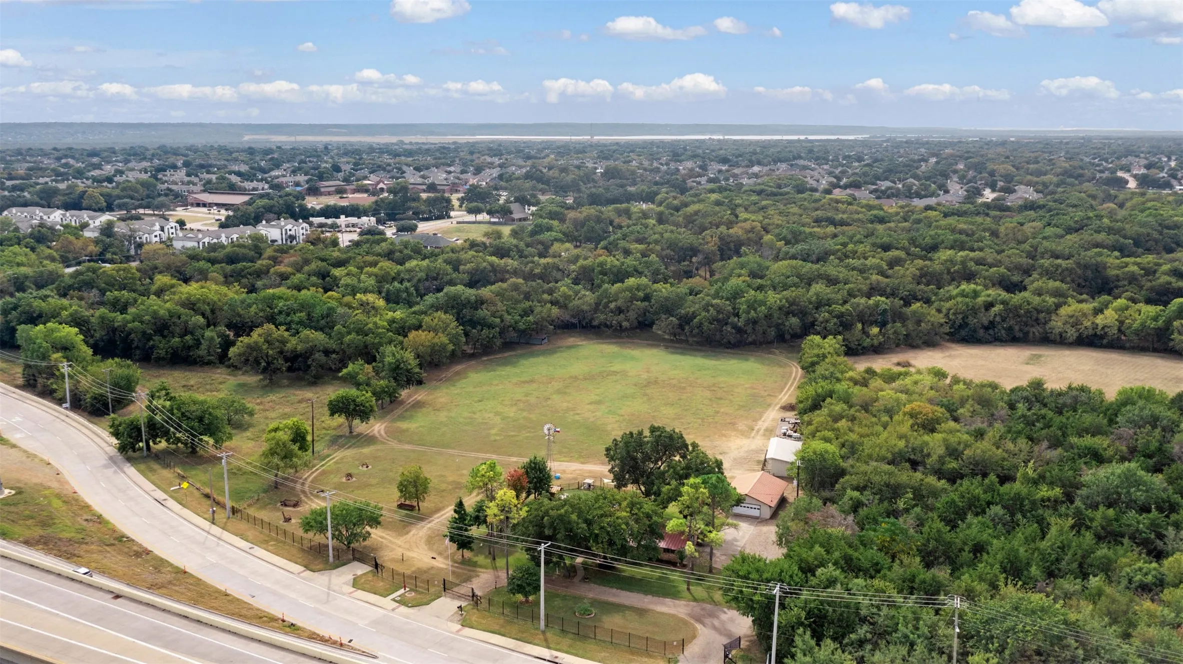 Discover this breathtaking 5.9-acre estate located on East Bound Frontage Road in Grand Prairie.