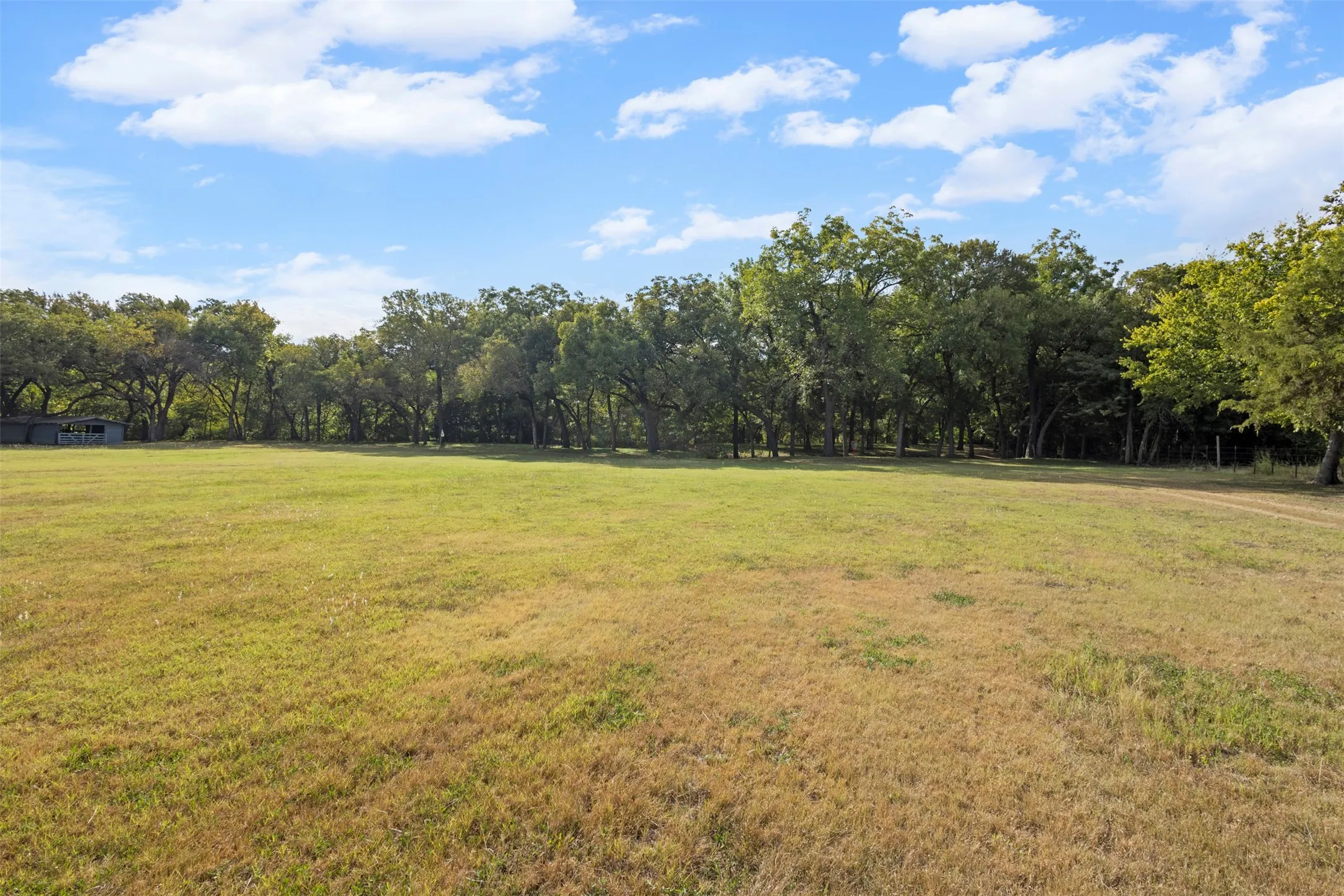 Discover this breathtaking 5.9-acre estate located on East Bound Frontage Road in Grand Prairie.