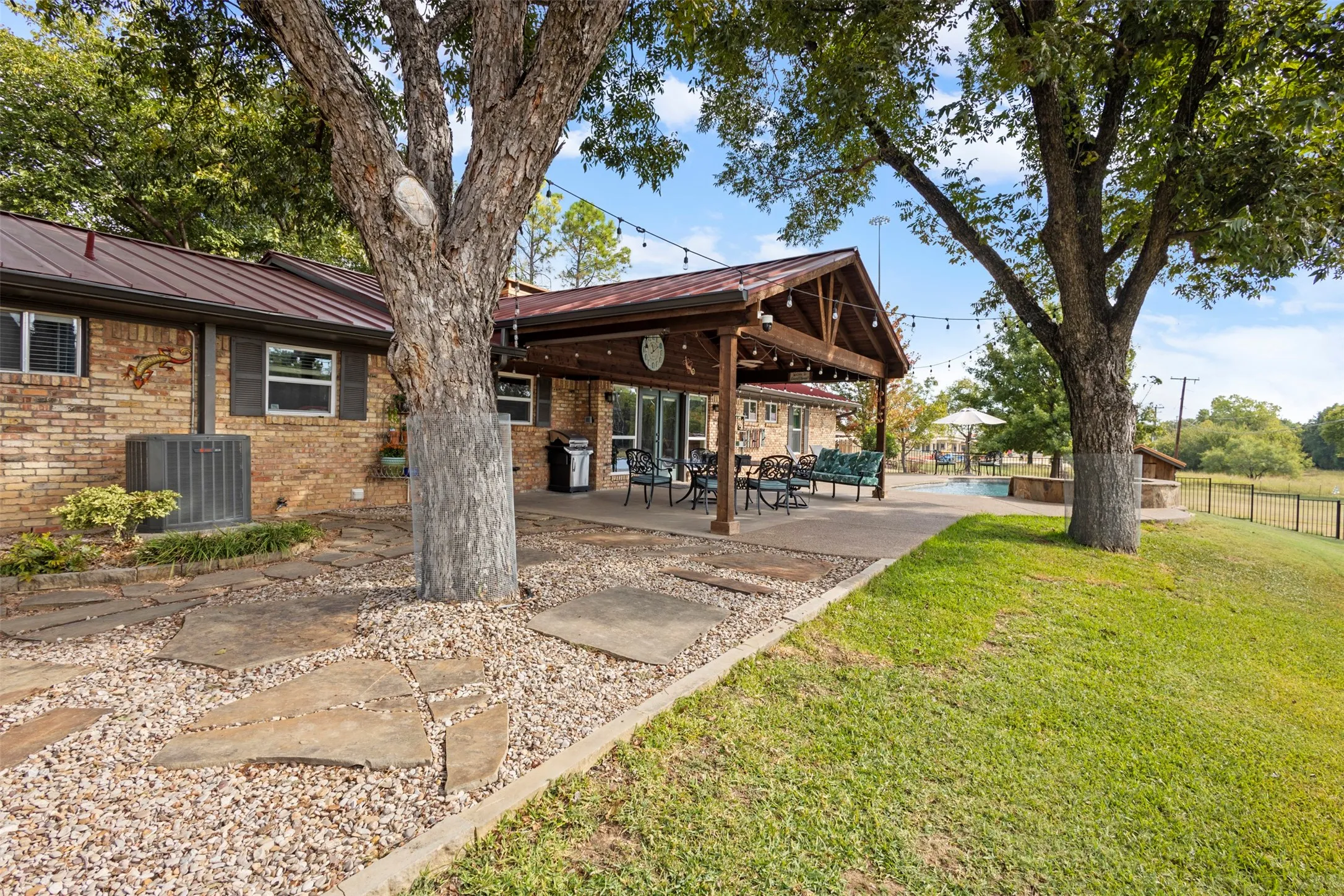 Beautiful covered back patio to enjoy the property
