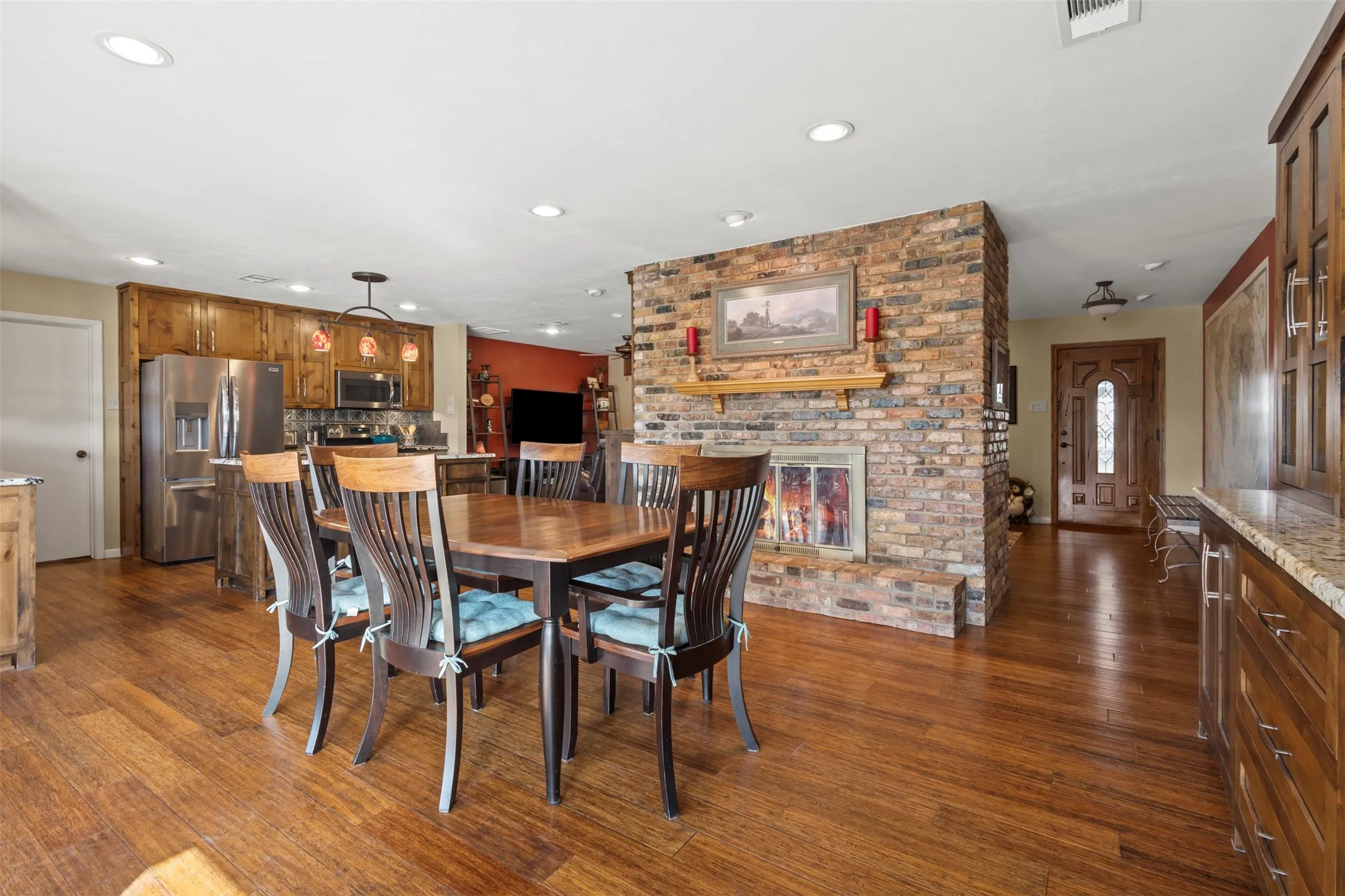 Brick fireplace in the dining room