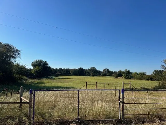 View of yard with a view of countryside