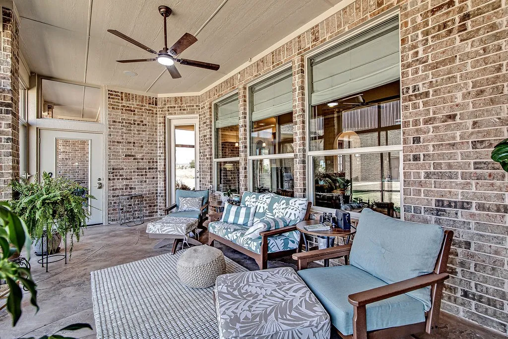 View of patio featuring a ceiling fan and outdoor lounge area