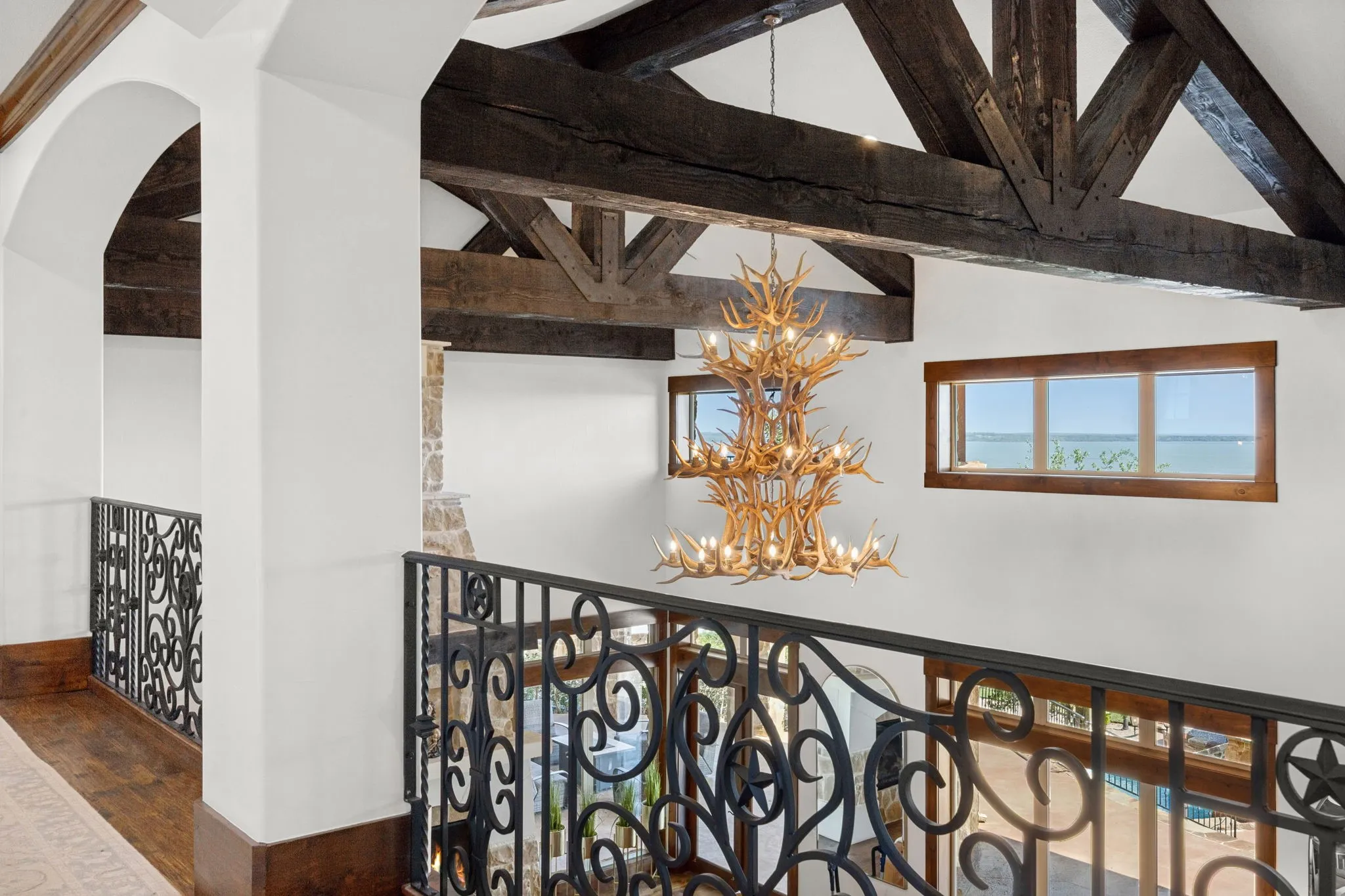 Exposed wood beams accentuating the vaulted ceiling