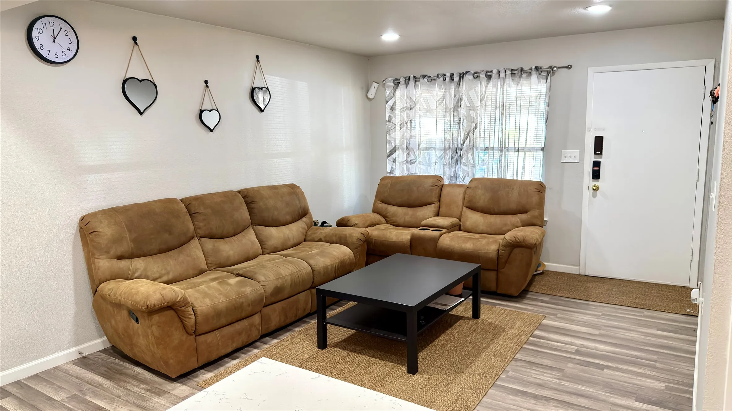 Living room with light wood floors