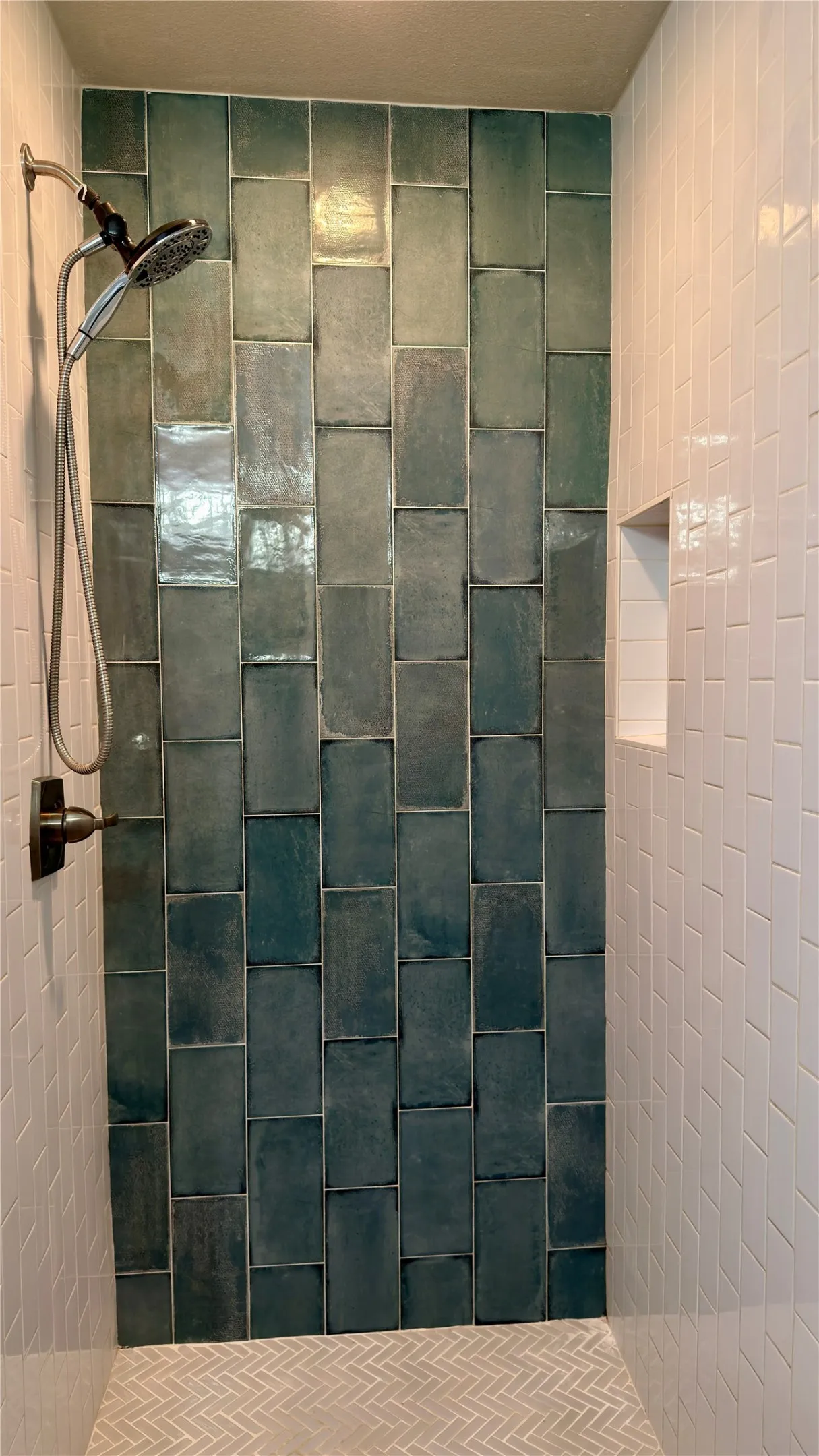 Full bath with a tile shower