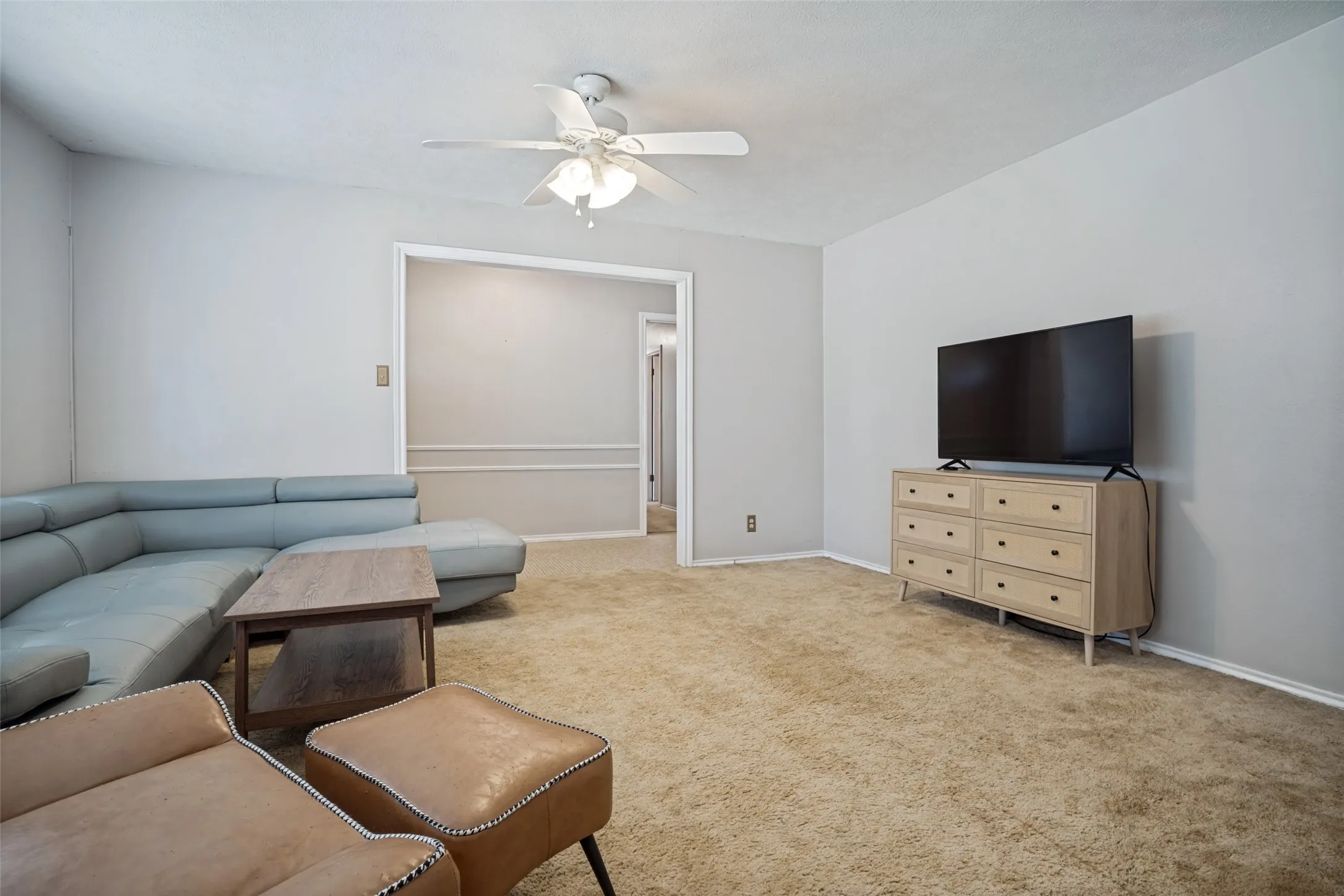 Sloped ceiling with a ceiling fan light fixture