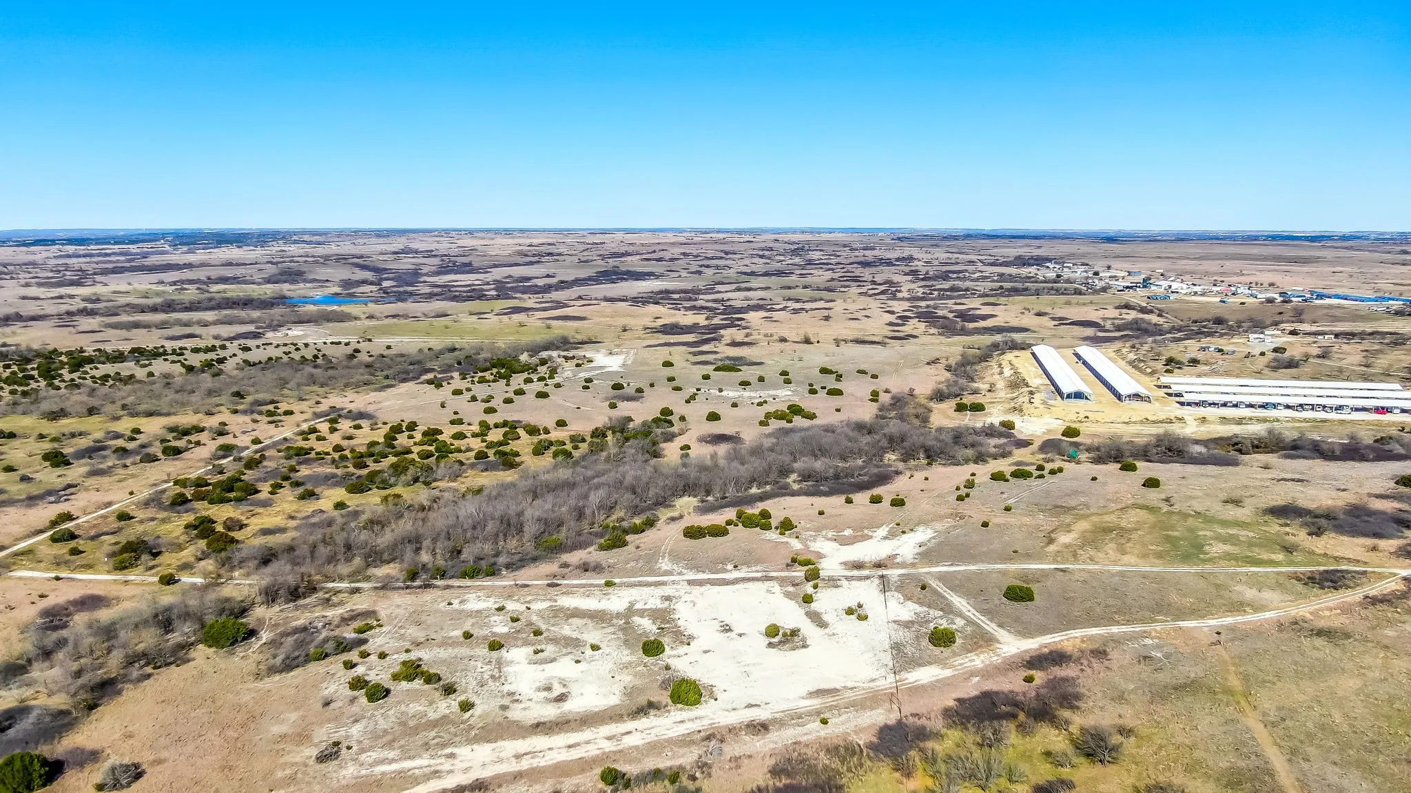 Aerial overview of property's location with rural landscape