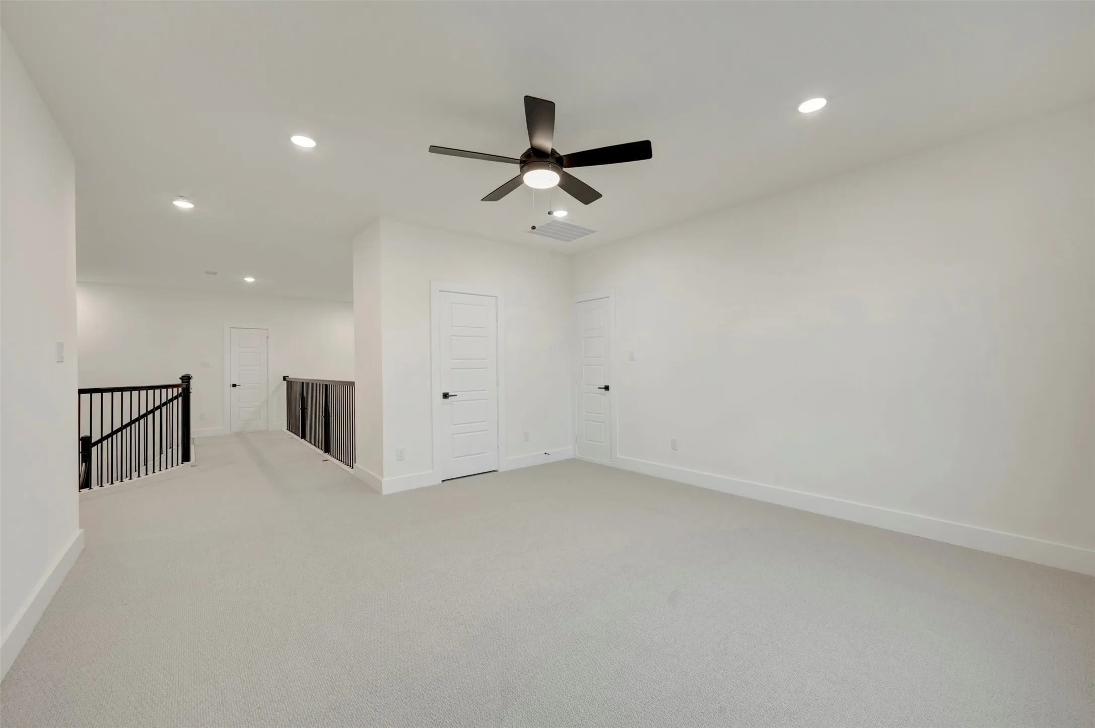 Retreat featuring light colored carpet, recessed lighting, and a ceiling fan