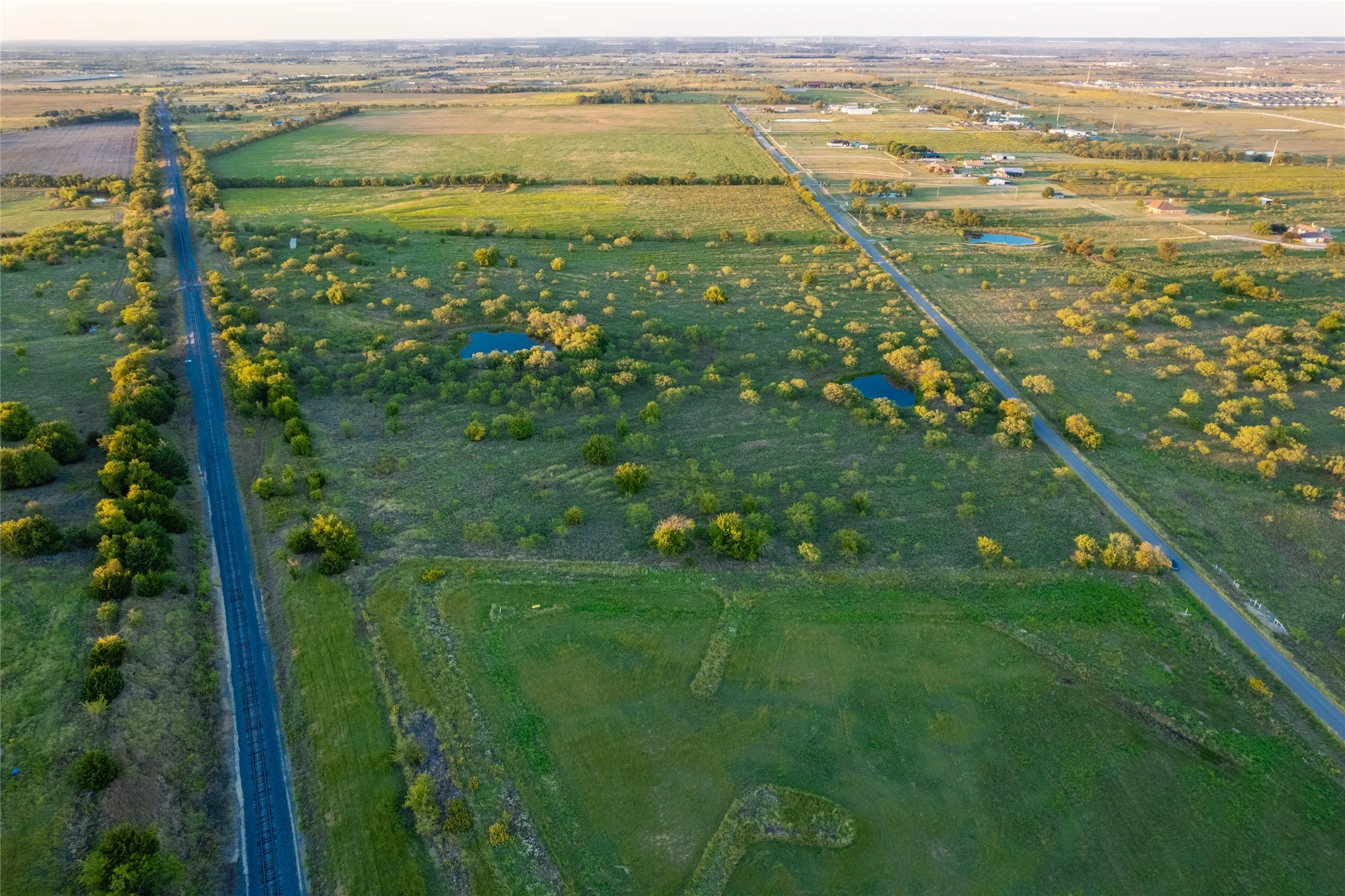 Aerial overview of property's location featuring rural landscape