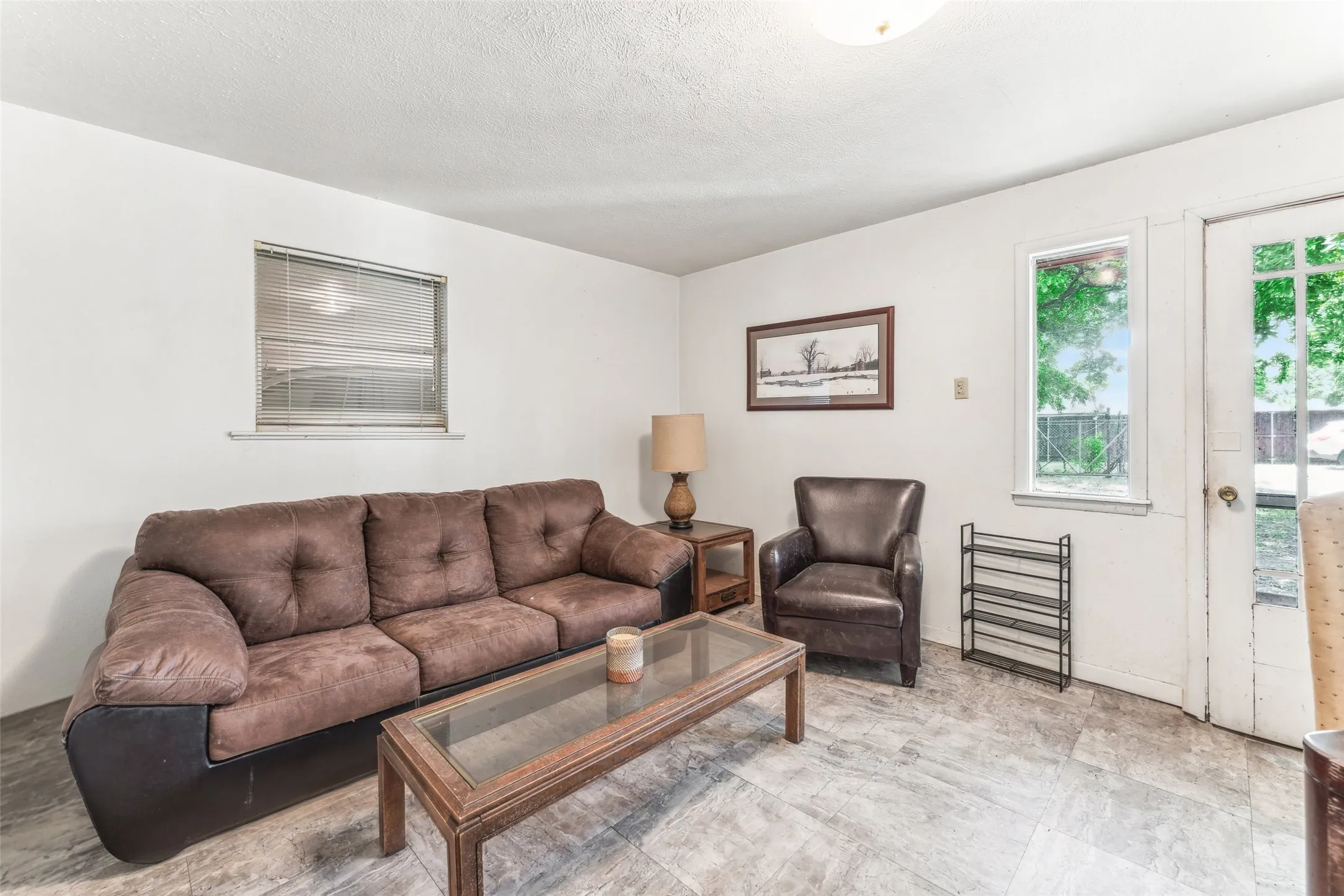 Living area with a textured ceiling