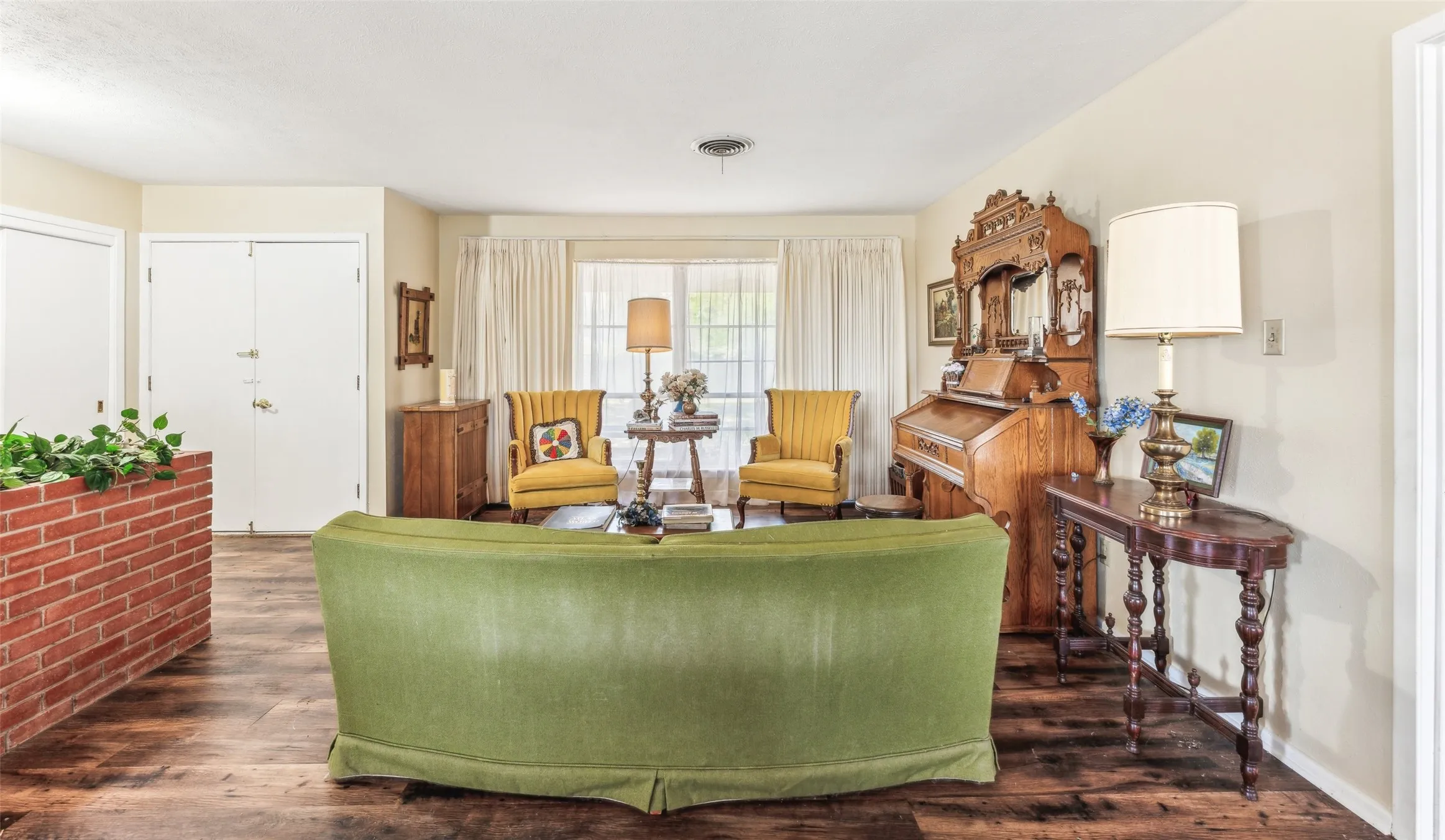 Living area with dark wood-style floors