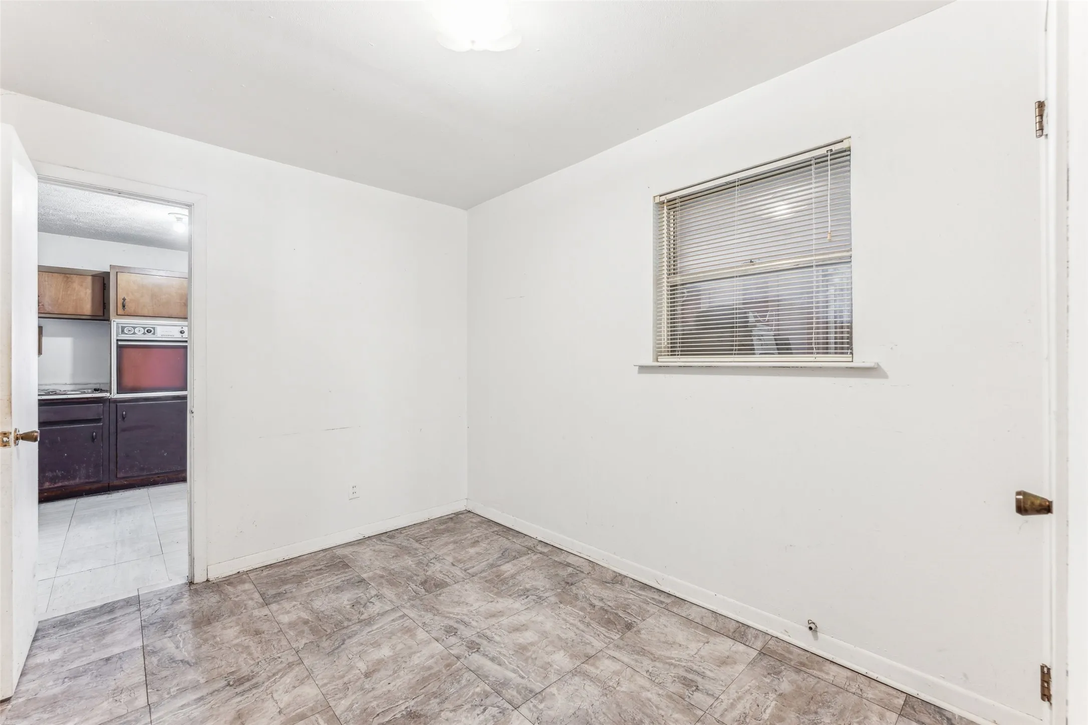 Spare room with baseboards