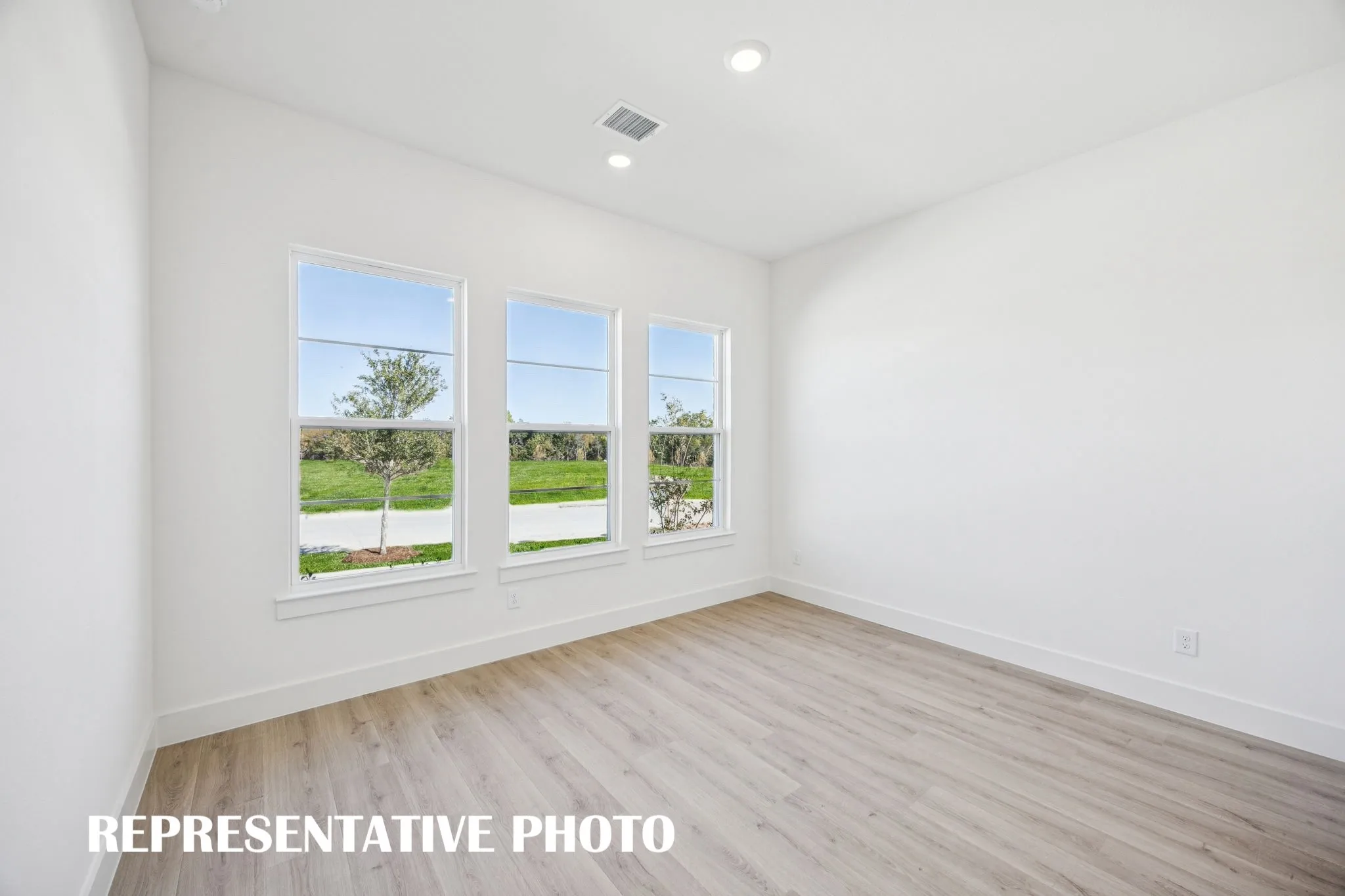 You&#039;ll find nicely sized secondary bedrooms in our Percy floor plan. REPRESENTATIVE PHOTO