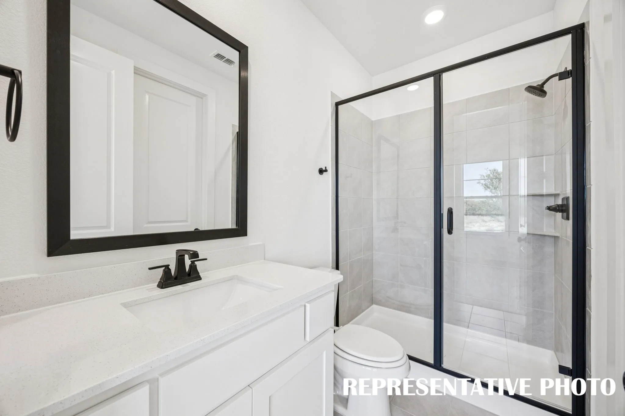 Friends and family will feel right at home in any of the beautifully finished guest baths in our Percy plan. REPRESENTATIVE PHOTO