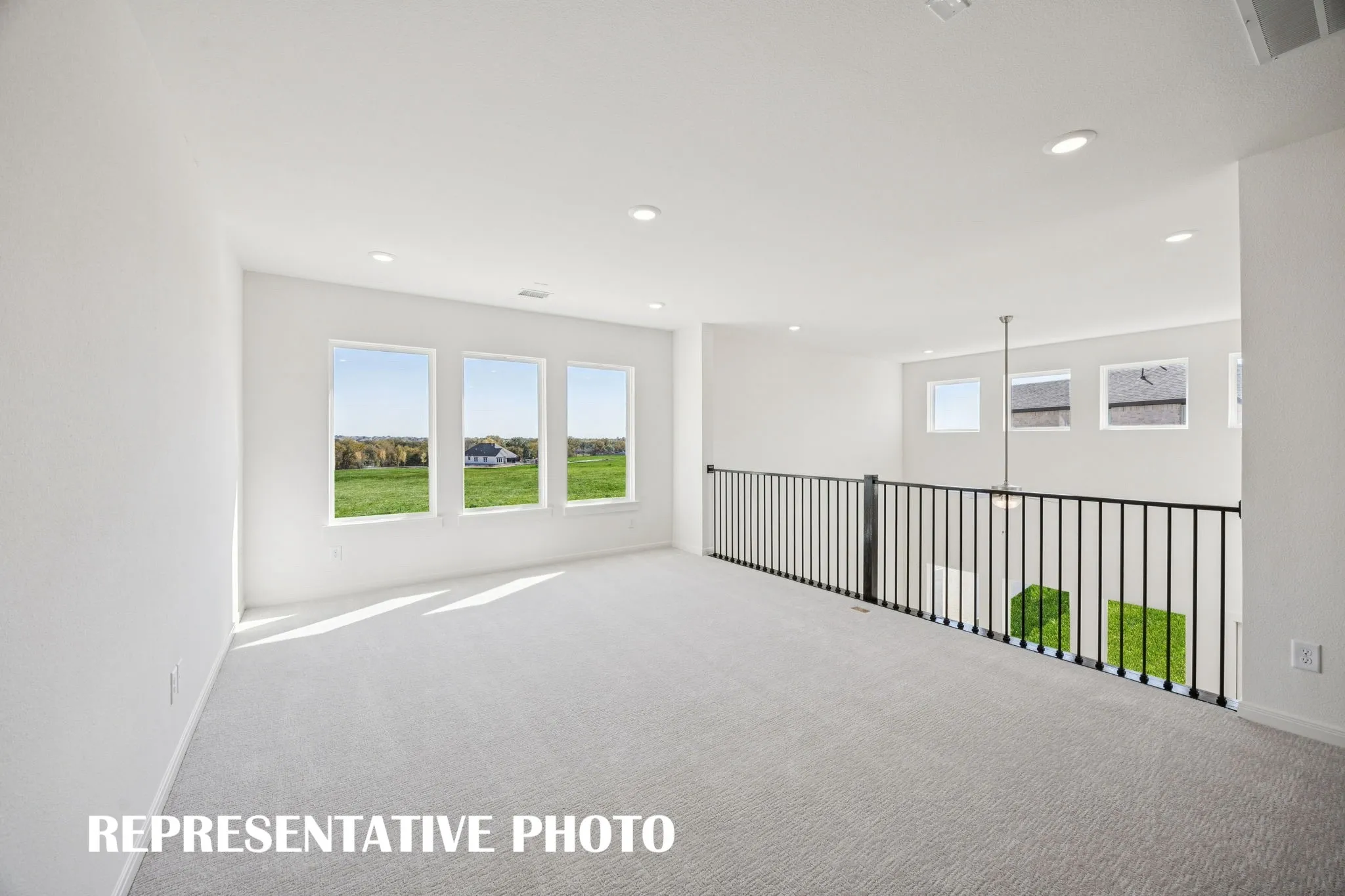 Light, bright and open, this lovely game room is the perfect place to host those big game day parties! REPRESENTATIVE PHOTO