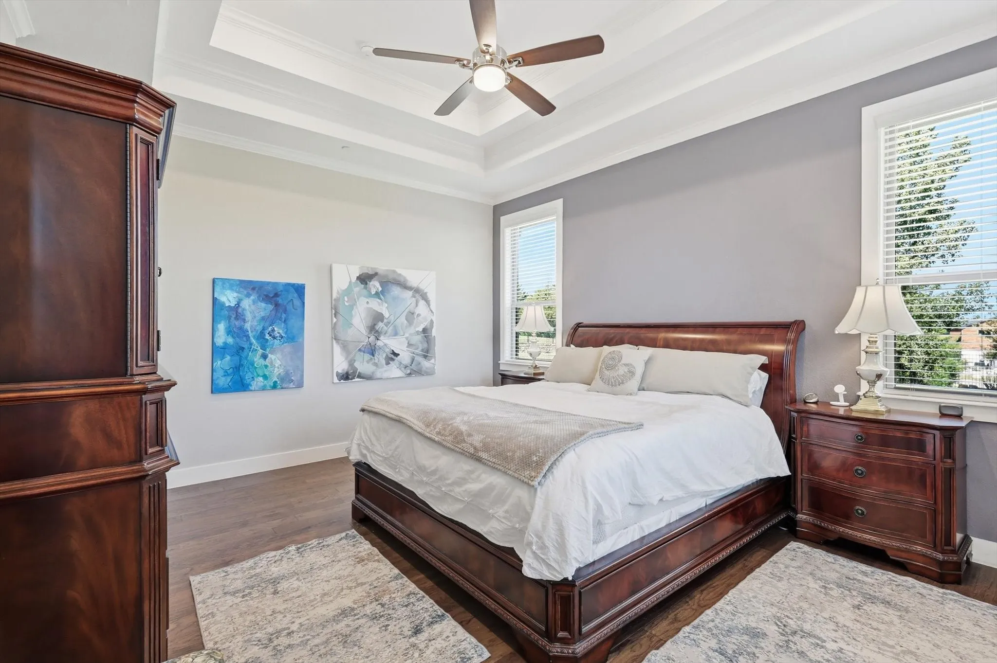 Soothing colors and tray ceiling add a nice touch.