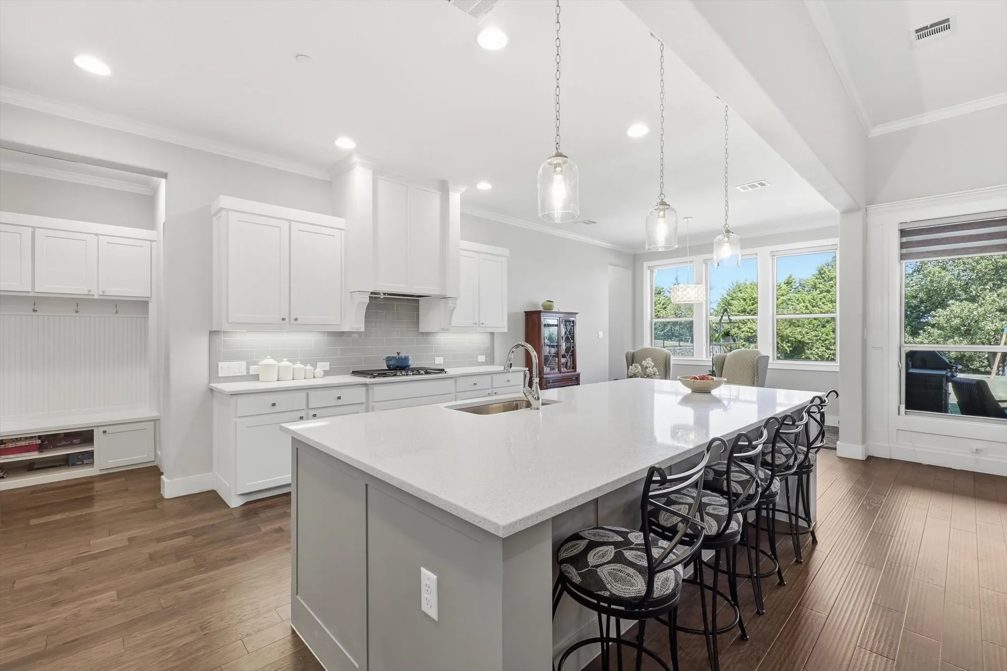 The oversized island offers great workspace and additional seating.
