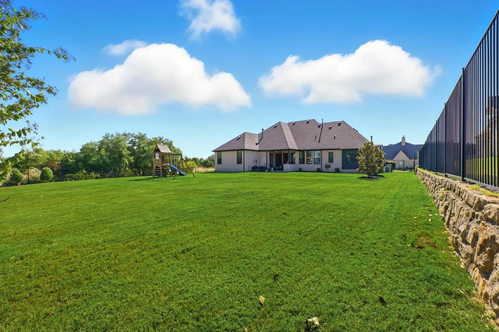 So much room for kids or pets to run and play.  Plenty of space to add a pool!