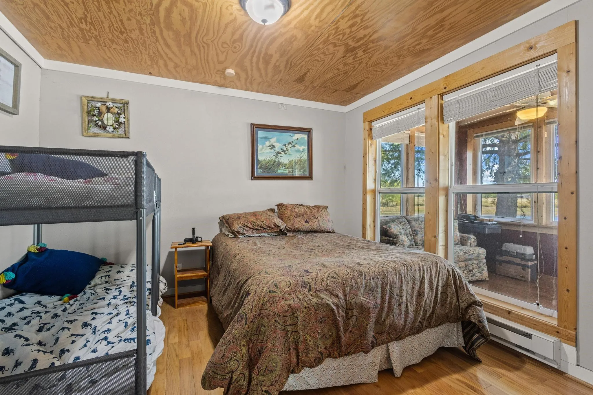 Bedroom offers views of the pond