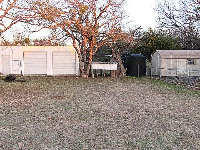 Yard and 2-vehicle garage