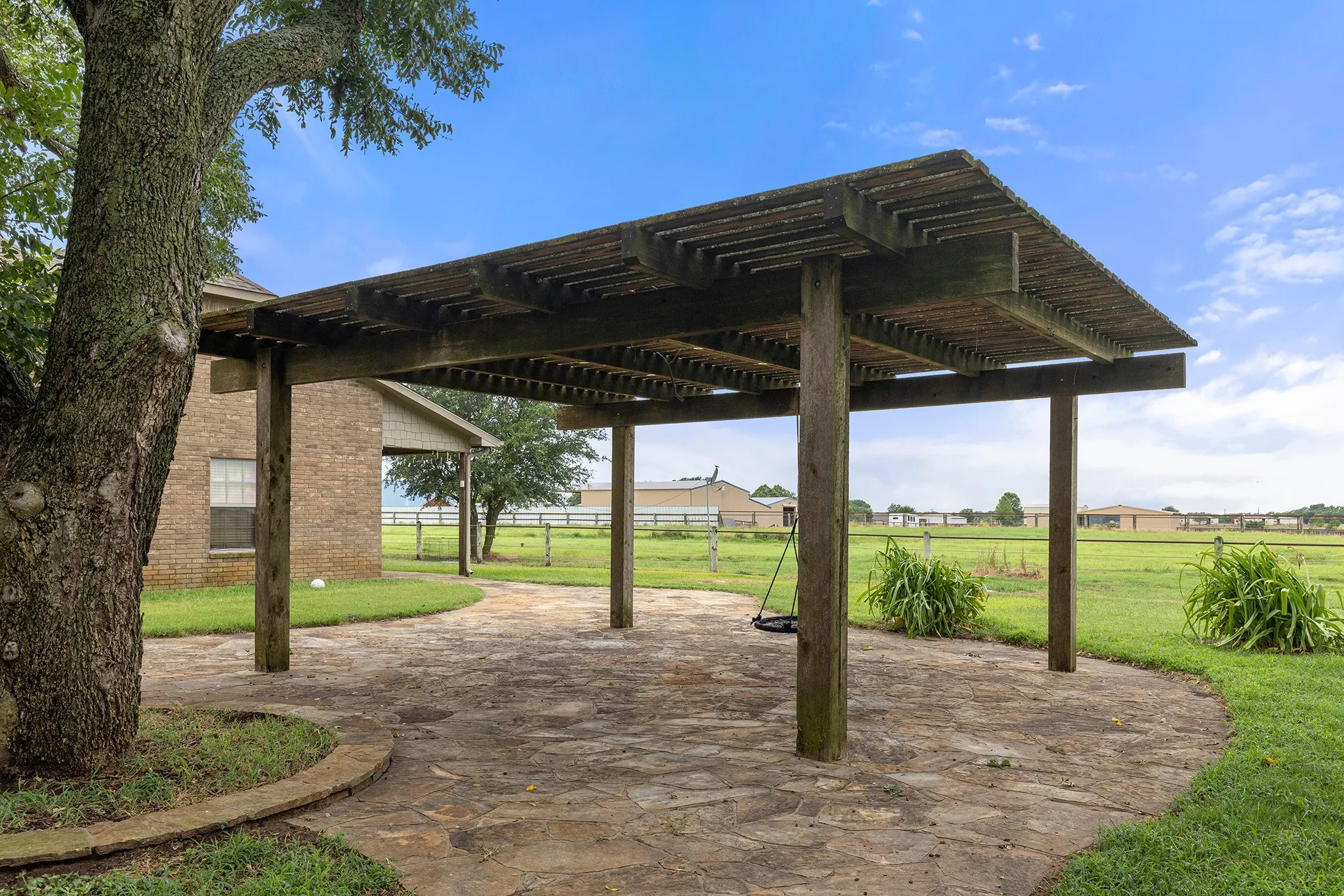 View of home's community featuring a patio and a pergola
