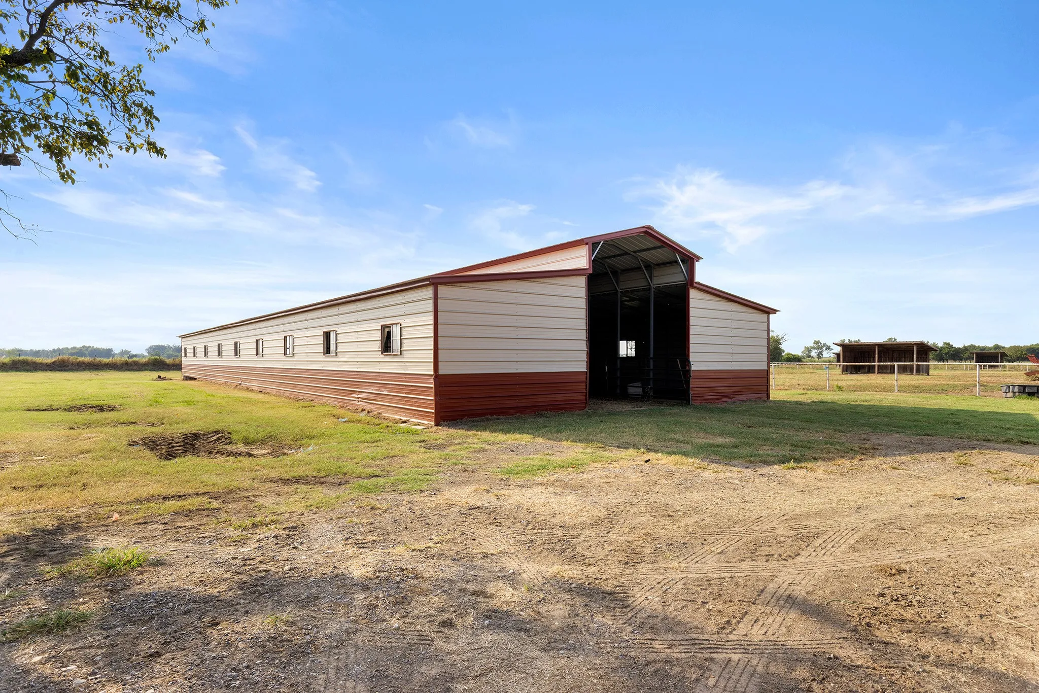 View of outbuilding with a rural view
