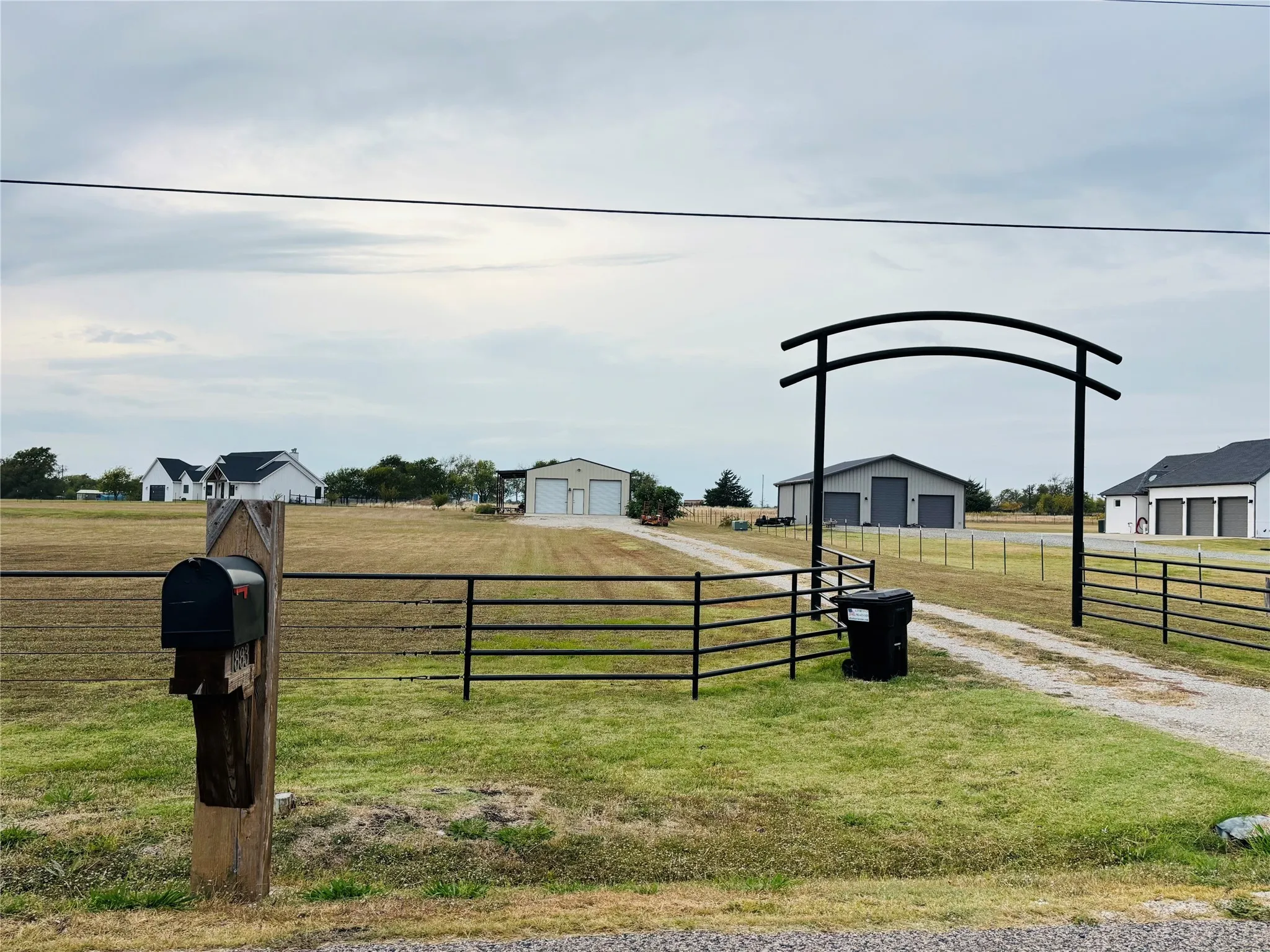 Welcoming Custom Arched Iron Work Entry