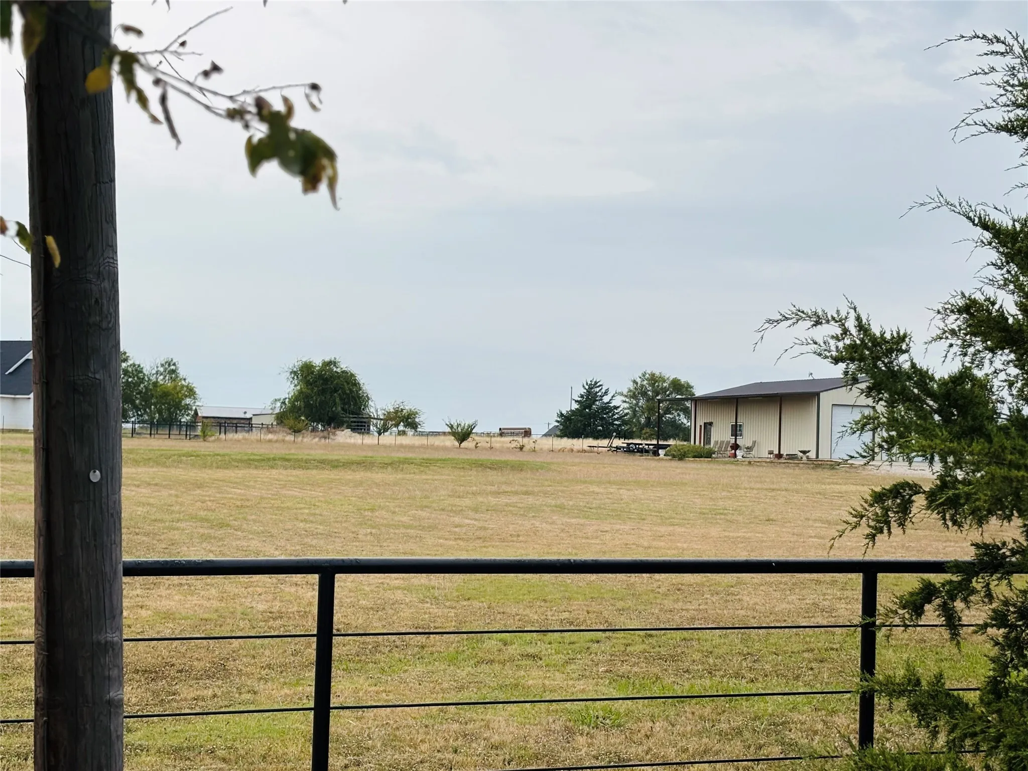 2 ACRES with Water, Electric and Septic & Fencing Done!! Tree line across the front of property