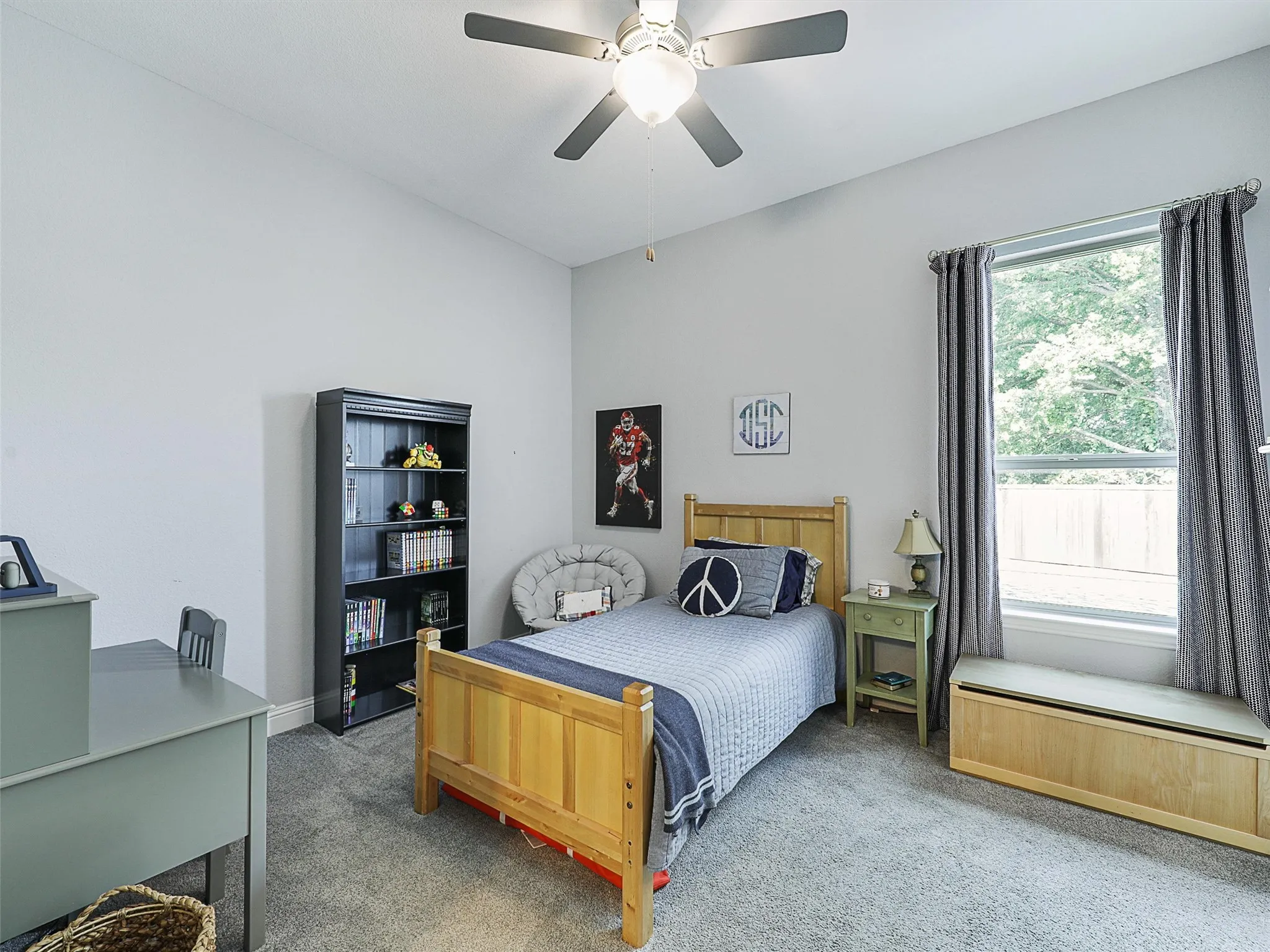 Bedroom featuring carpet floors and a ceiling fan