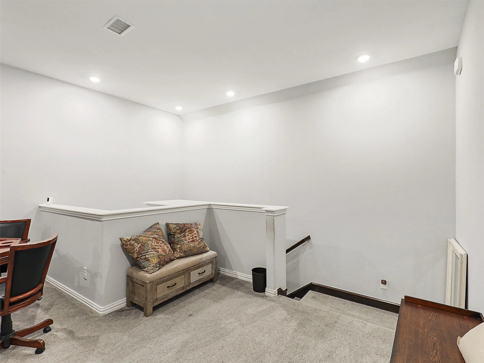Home office featuring light colored carpet and recessed lighting