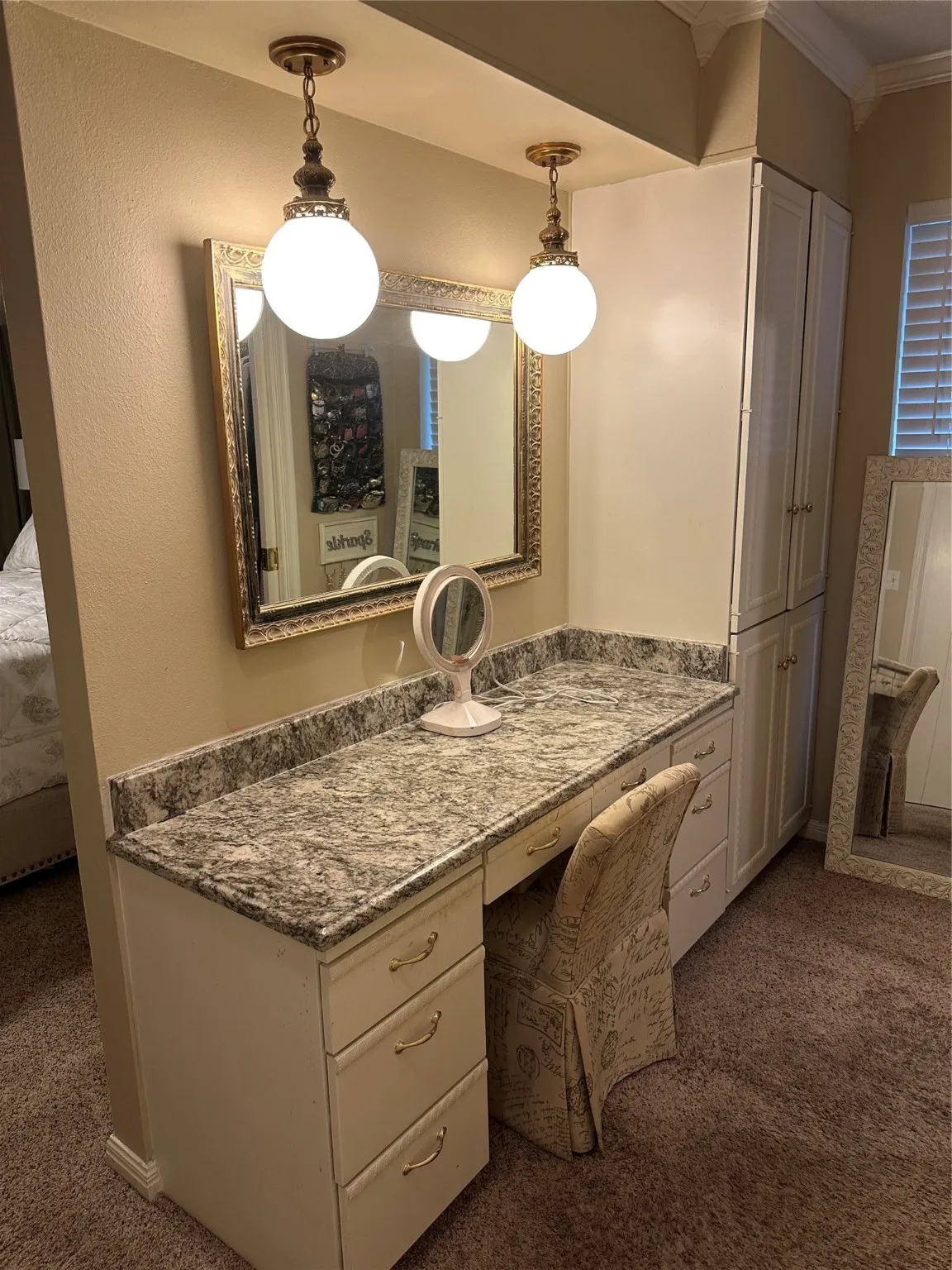 Full bath with dark carpet, vanity, connected bathroom, and crown molding