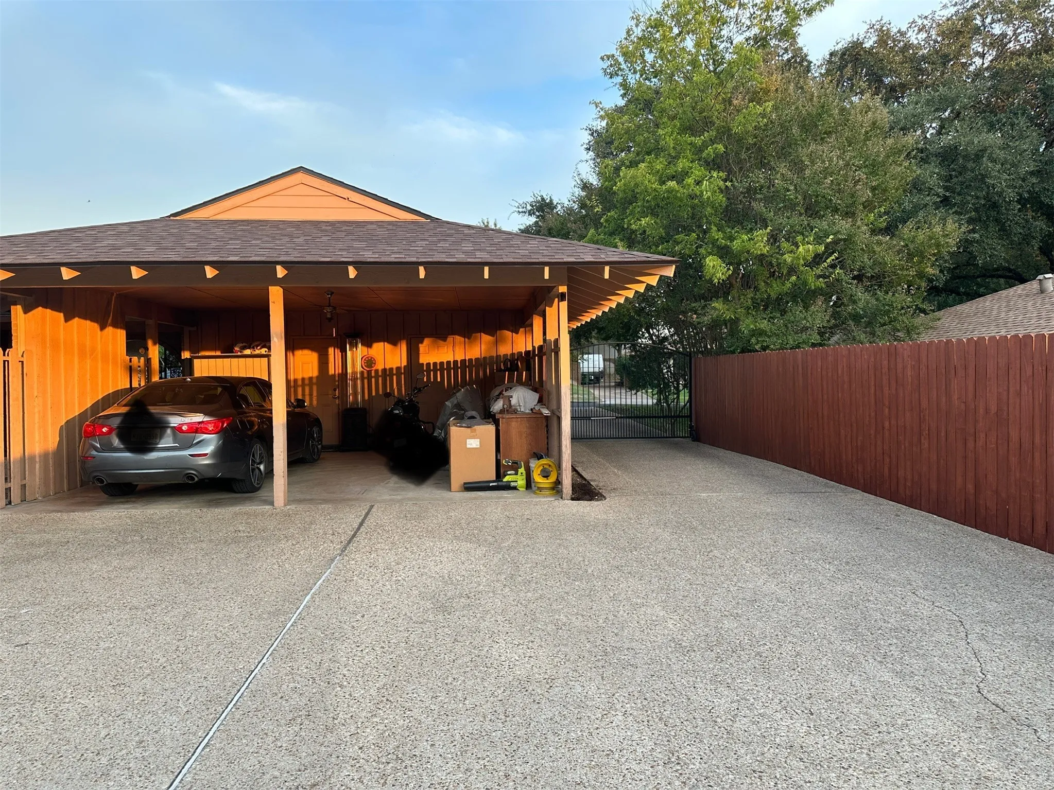View of car parking with a gate