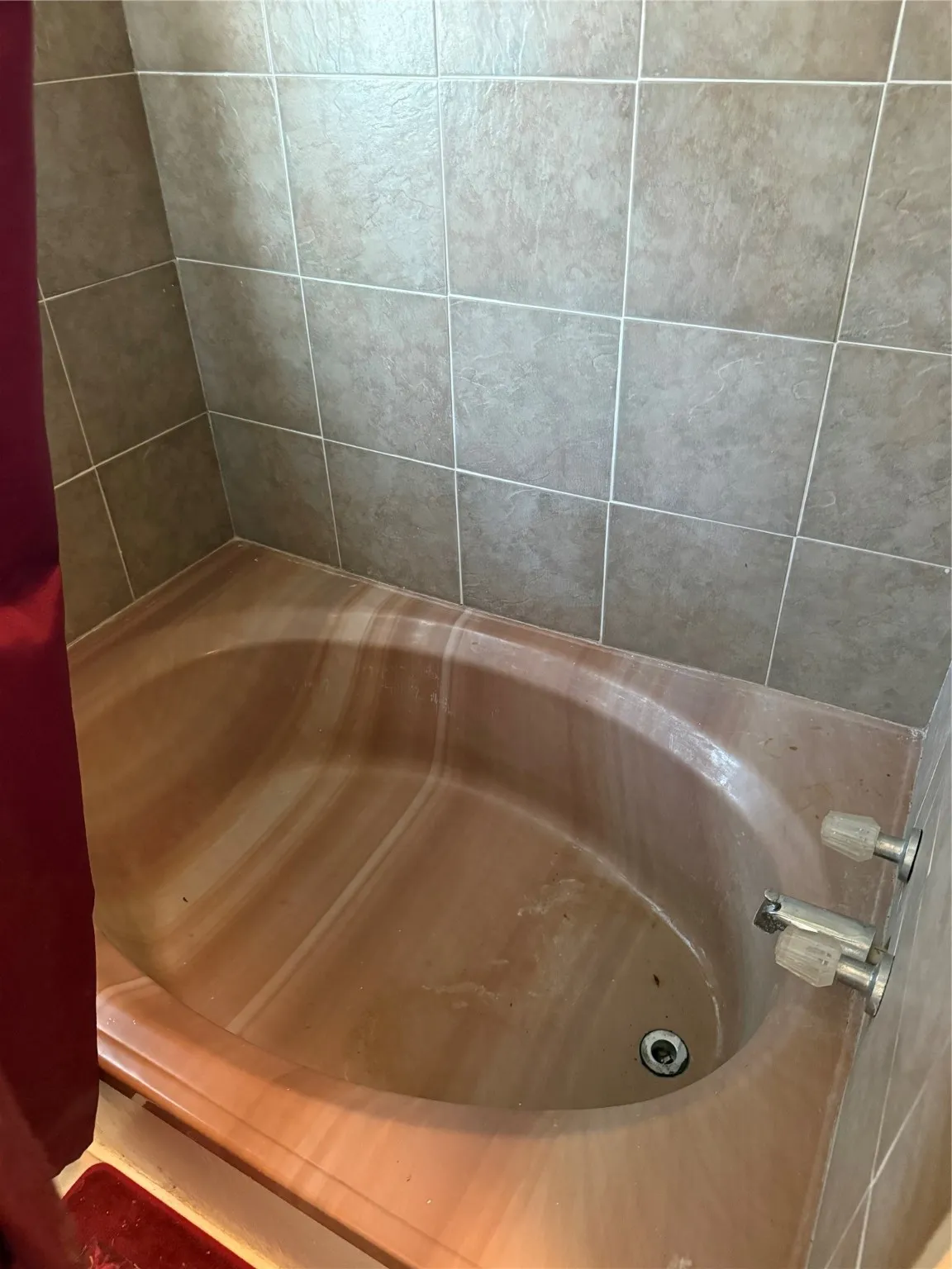 Bathroom with a tub to relax in