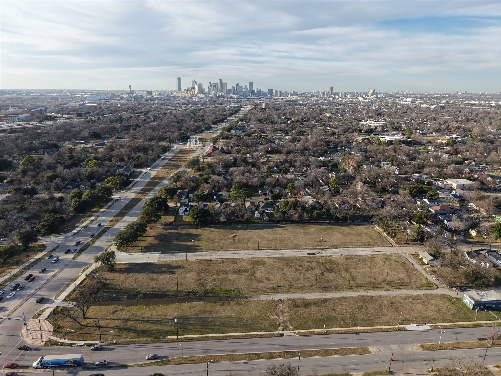 Aerial view of property and surrounding area with skyline