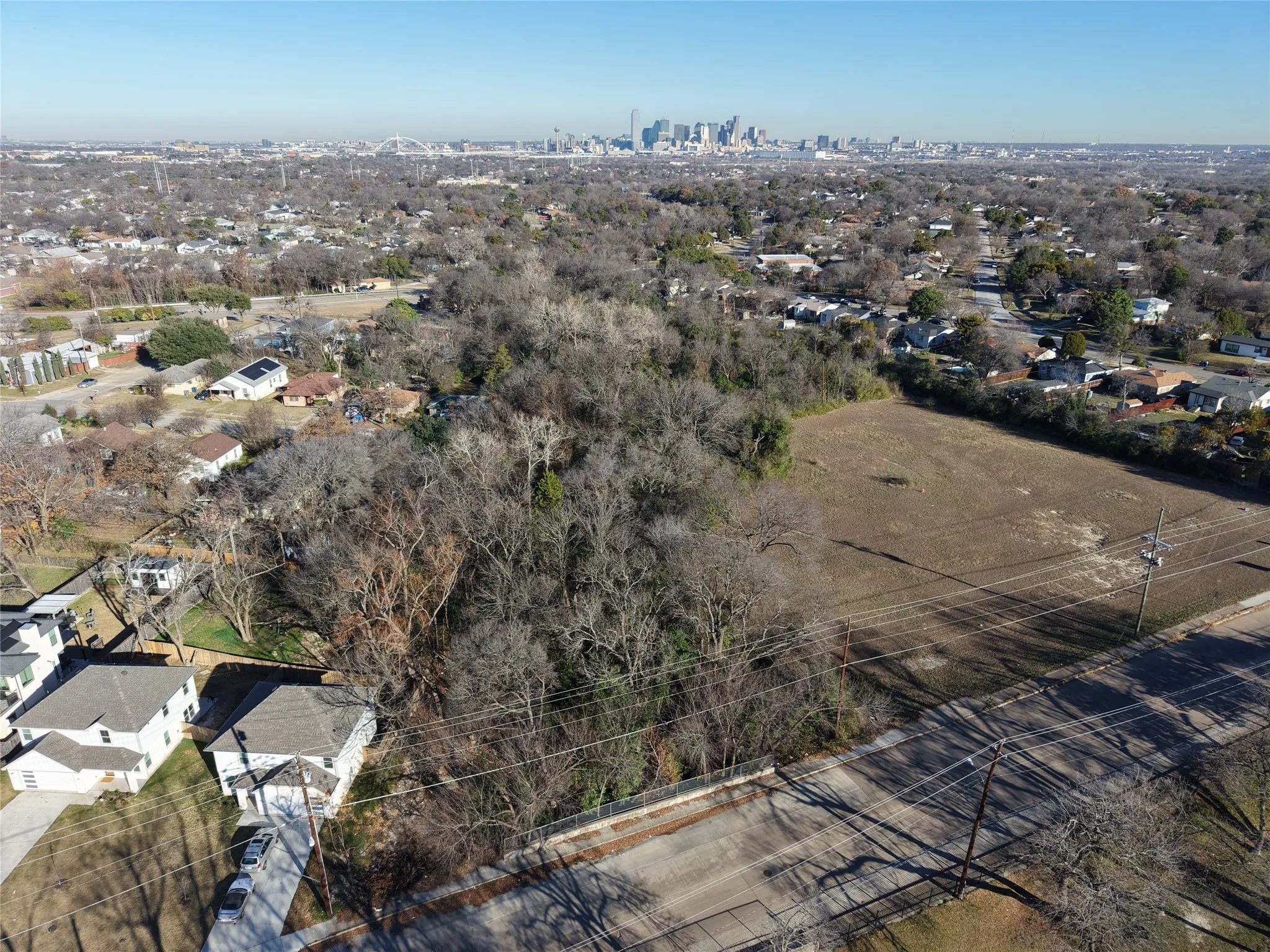 View of property location with nearby suburban area and skyline